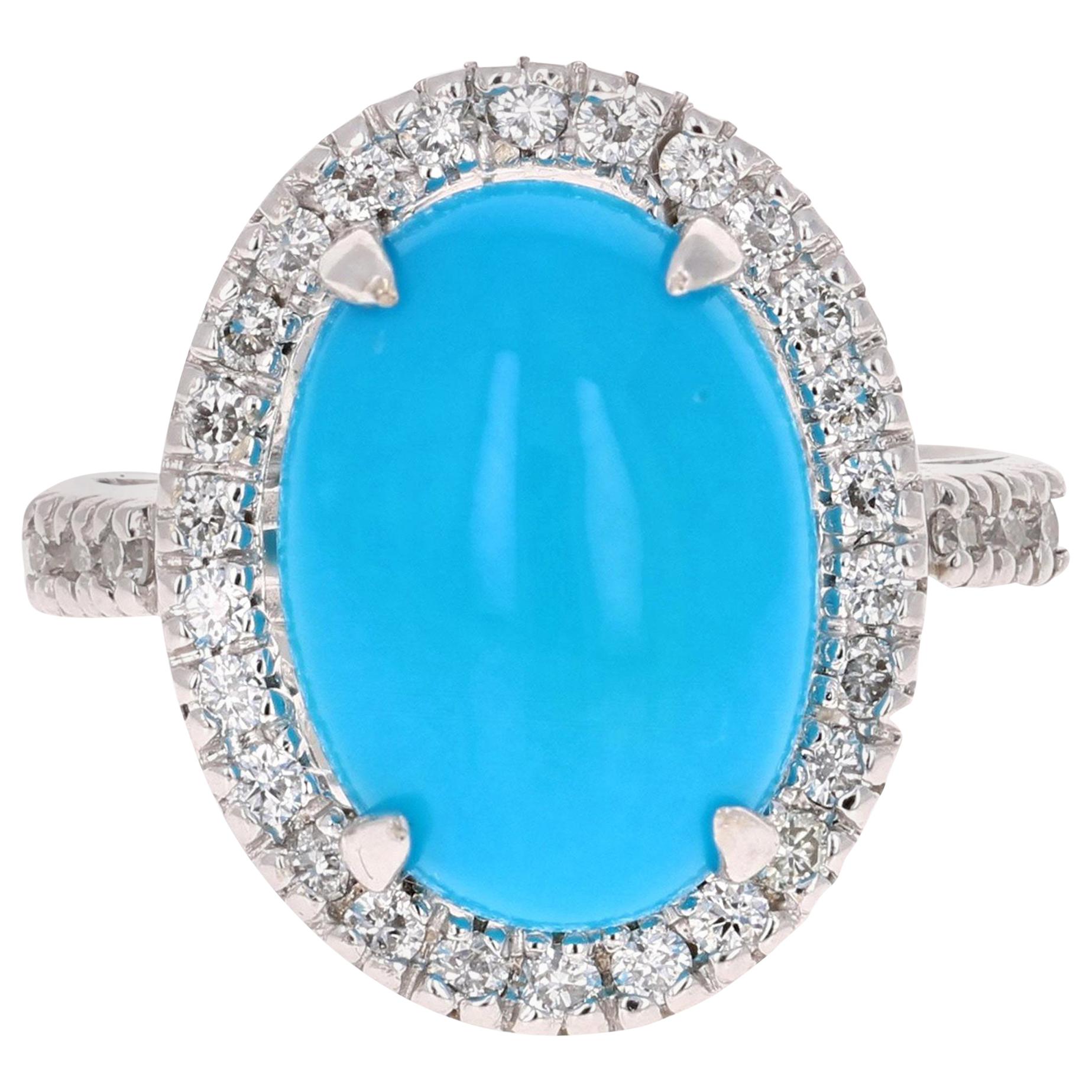 Bague à la mode en or blanc avec diamants et turquoise taille ovale de 5,26 carats en vente