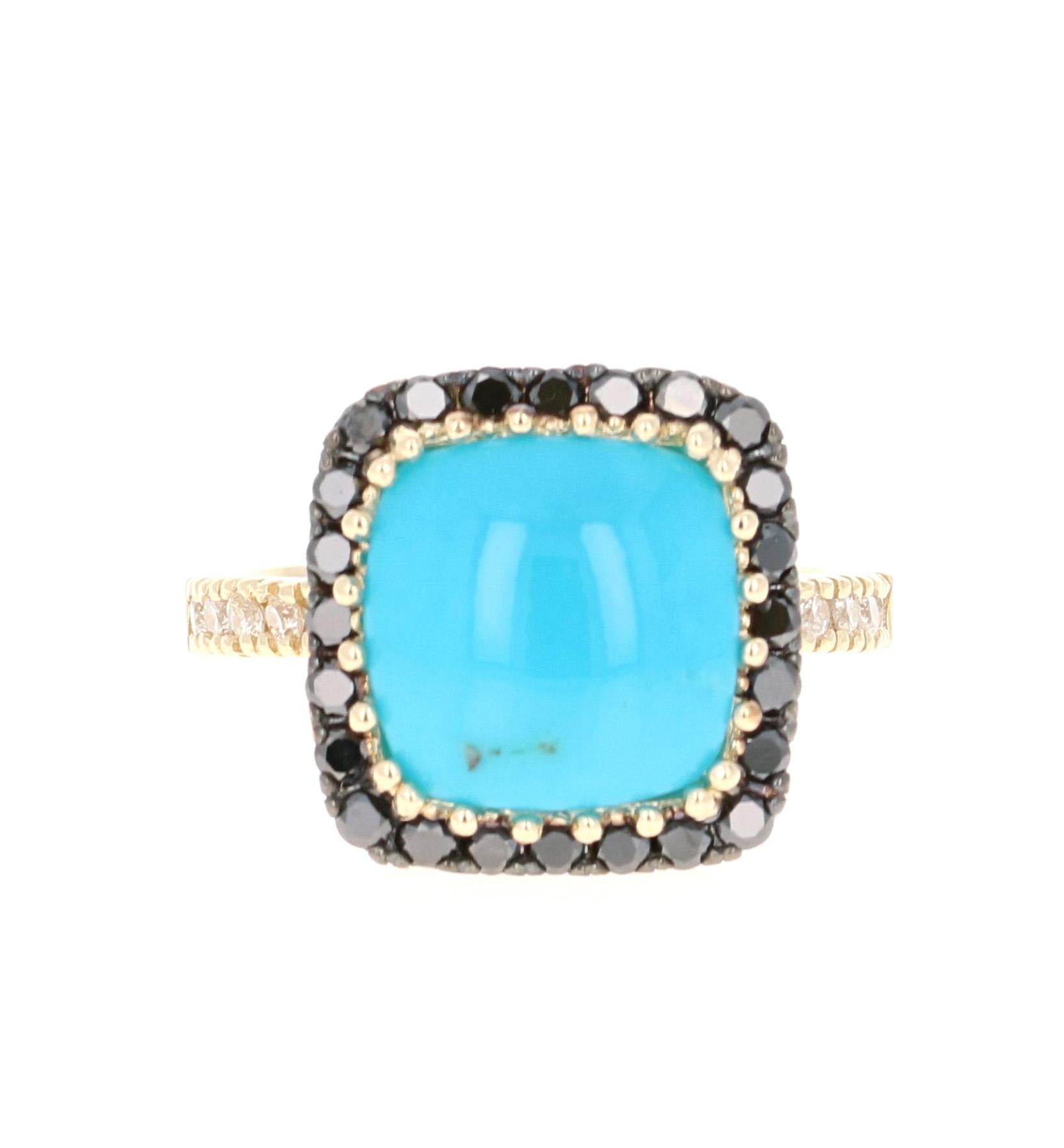 A unique stunner! 

This ring has a 4.47 Carat Cushion Cut Turquoise and is surrounded by 24 Black Round Cut Diamonds that weigh 0.56 Carats. The sides of the ring have 10 White Round Cut Diamonds that weigh 0.23 Carats. The total carat weight of