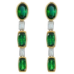 5.26 cts Natural Tsavorite 
0.51 cts Diamonds 18K 2-Tone Gold Earrings