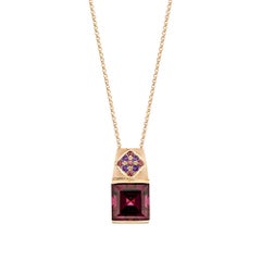Sunita Nahata Rhodolite 5.26ct. Pendant in 18KRG with Amethyst & Tourmaline.