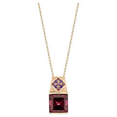 5.268 Carat Rhodolite Pendant in 18KRG with Amethyst and Pink Tourmaline.