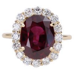 5.26ct Oval Ruby GIA and Round Diamond Halo Ring in 18 Karat Yellow Gold