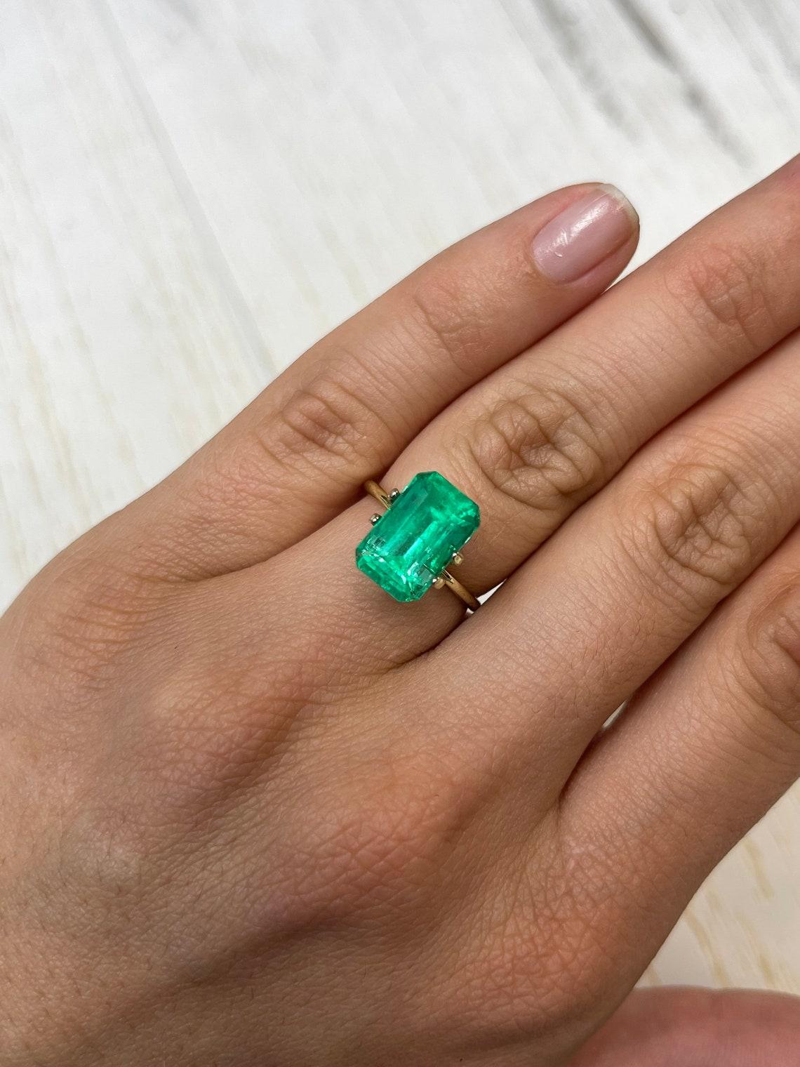 5,26ct Verde amarillento Muzo Gema colombiana talla esmeralda 12,5x8,2 Genuina Mayo en venta 3