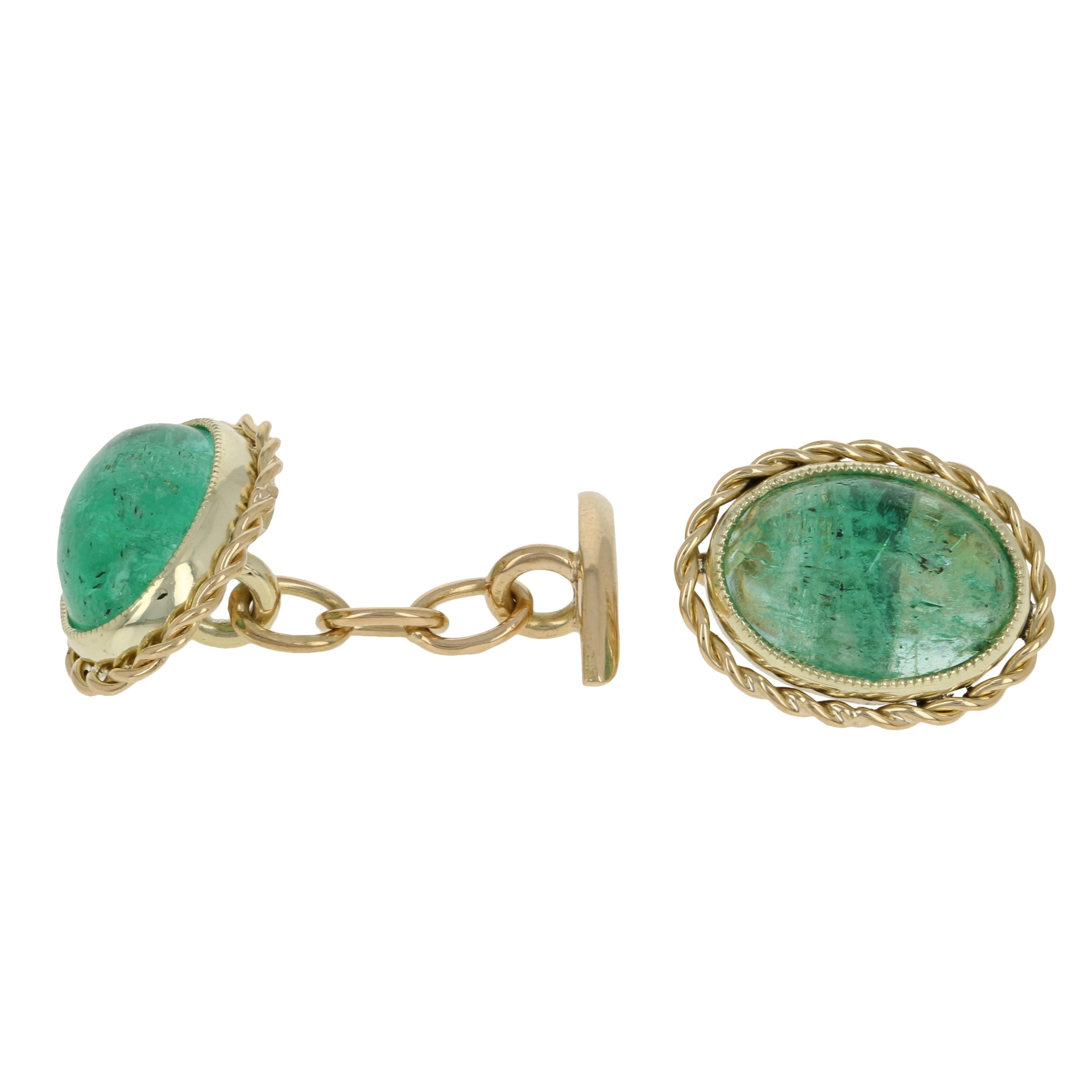 Add a pop of color to your formal attire with these cufflinks! Crafted in 18k yellow gold, this handsome pair hosts luminous emerald cabochons framed by glowing rope borders.  

Metal Content: Guaranteed 18k Gold as stamped

Stone