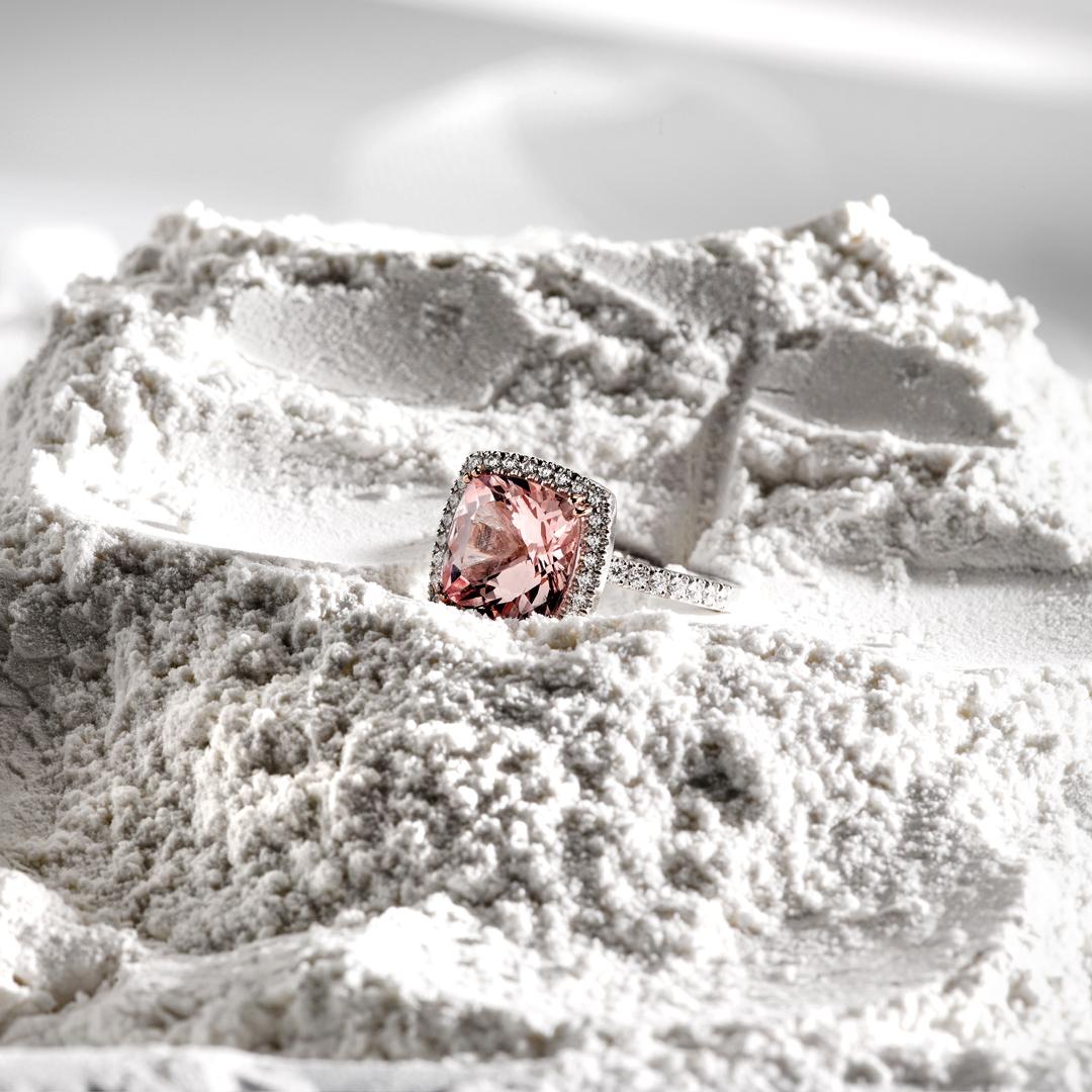 Made by Matthew Ely in 18ct white gold, this morganite and diamond halo cocktail ring feautures a 5.27ct square cushion morganite surrounded by 61 diamonds totalling 0.37ct.

Resizing available free of charge (depending on possibility).