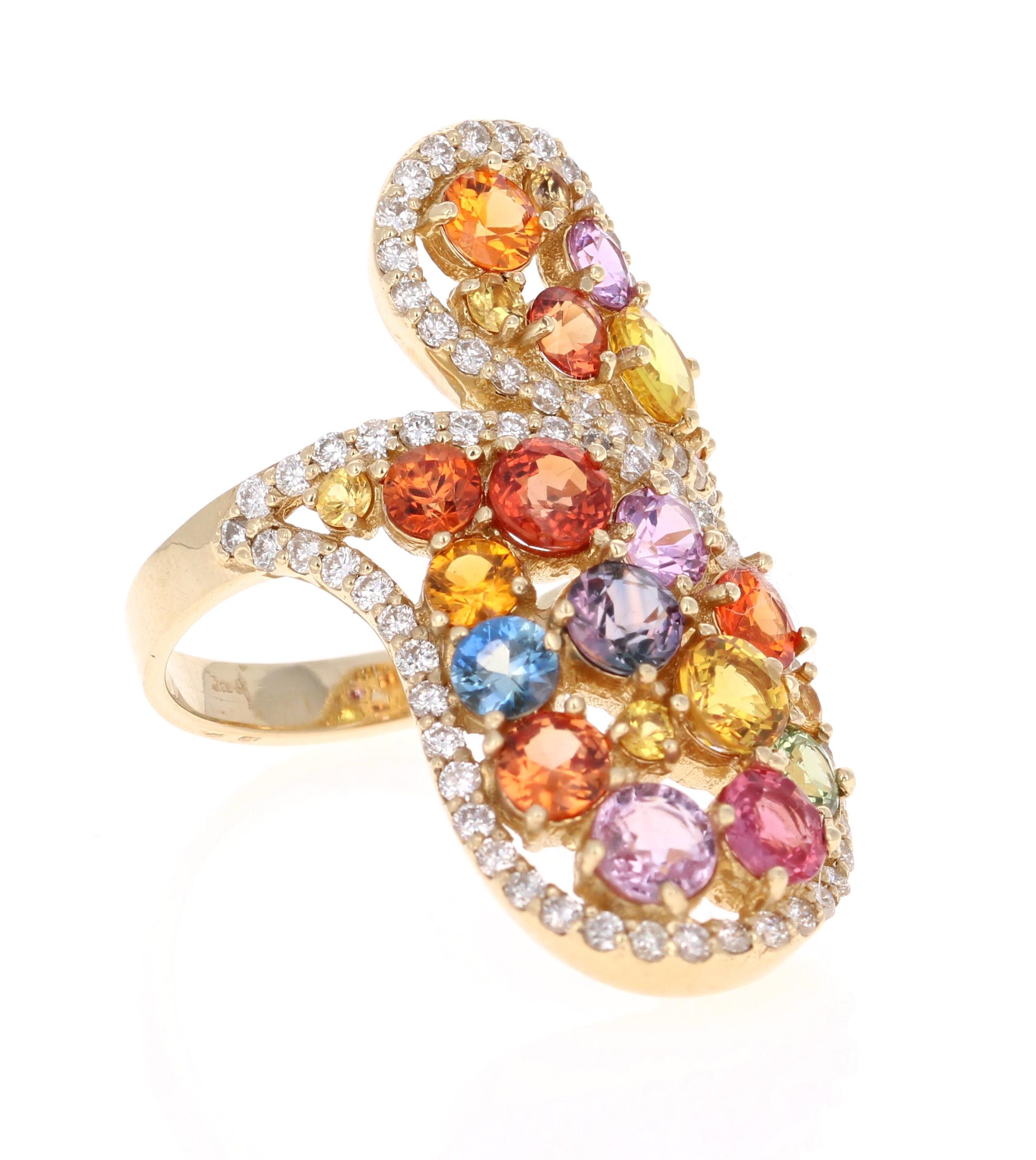 Super gorgeous and uniquely designed 5.27 Carat Multi-Colored Sapphire and Diamond 14K Yellow Gold Cocktail Ring!

This ring has a cluster of 22 Round Cut Multi-Colored Sapphires that weigh 4.47 carats and 73 Round Cut Diamonds that weigh 0.80