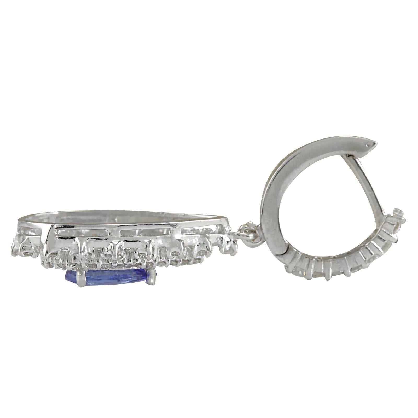 Stamped: 14K White Gold
Total Earrings Weight: 8.1 Grams
Total Natural Tanzanite Weight is 2.89 Carat (Measures: 9.00x6.00 mm)
Color: Blue
Total Natural Diamond Weight is 2.38 Carat
Color: F-G, Clarity: VS2-SI1
Face Measures: 21.90x15.75 mm
Sku: