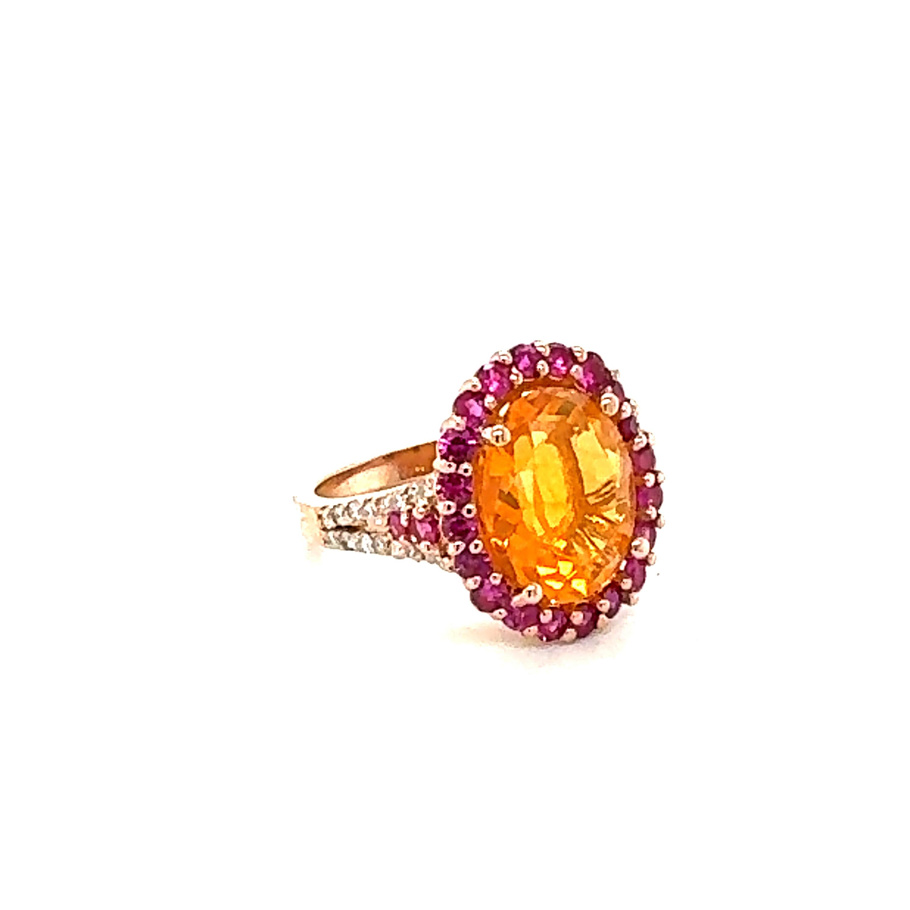 5.27 Carat Oval Cut Fire Opal Sapphire Diamond Yellow Gold Cocktail Ring

This ring has a 3.76 Carat Oval Cut Orange Fire Opal as its center stone and is elegantly surrounded by 24 Round Cut Pink Sapphires that weigh 1.20 Carats and 32 Round Cut