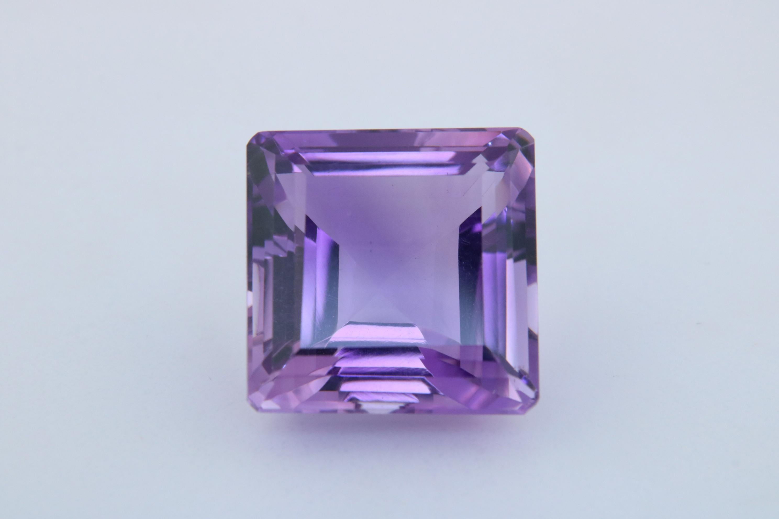 A collector's 52.78 carat, Radiant-Cut Amethyst Gem.

Shape: Octagon
Crown: Step
Pavilion: Step
Dimensions: 21.76 x. 21.61 x 15.20 mm
Color: Purple
Weight: 52.78 Carats

No Heat/Treatment

This stone is available for direct purchase or for the