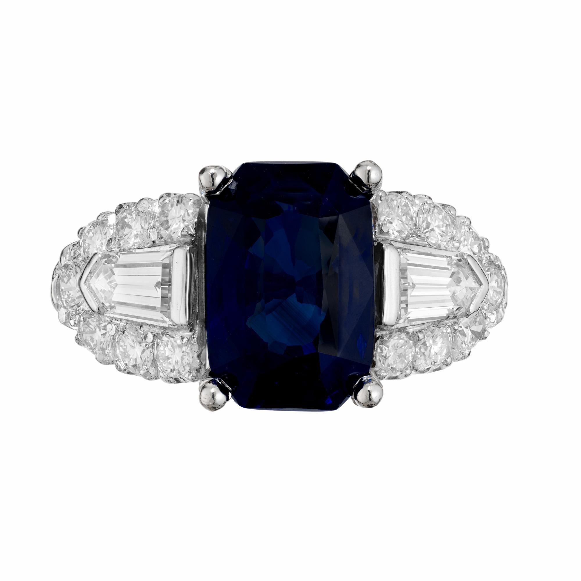 Truly spectacular 1920’s Art Deco Emerald Cut Sapphire and diamond Platinum engagement ring. AGTA certified simple heat only 5.28ct octagonal cornflower blue sapphire center stone, mounted in a platinum setting with 2 bullet shaped side diamonds and