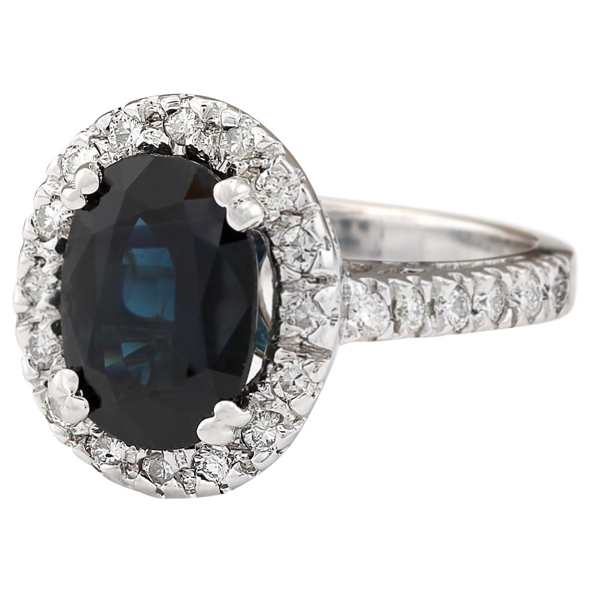 5.28 Carat Natural Sapphire 14 Karat White Gold Diamond Ring
Stamped: 14K White Gold
Total Ring Weight: 7.4 Grams
Total Natural Sapphire Weight is 4.58 Carat (Measures: 11.00x9.00 mm)
Color: Blue
Total Natural Diamond Weight is 0.70 Carat
Color: