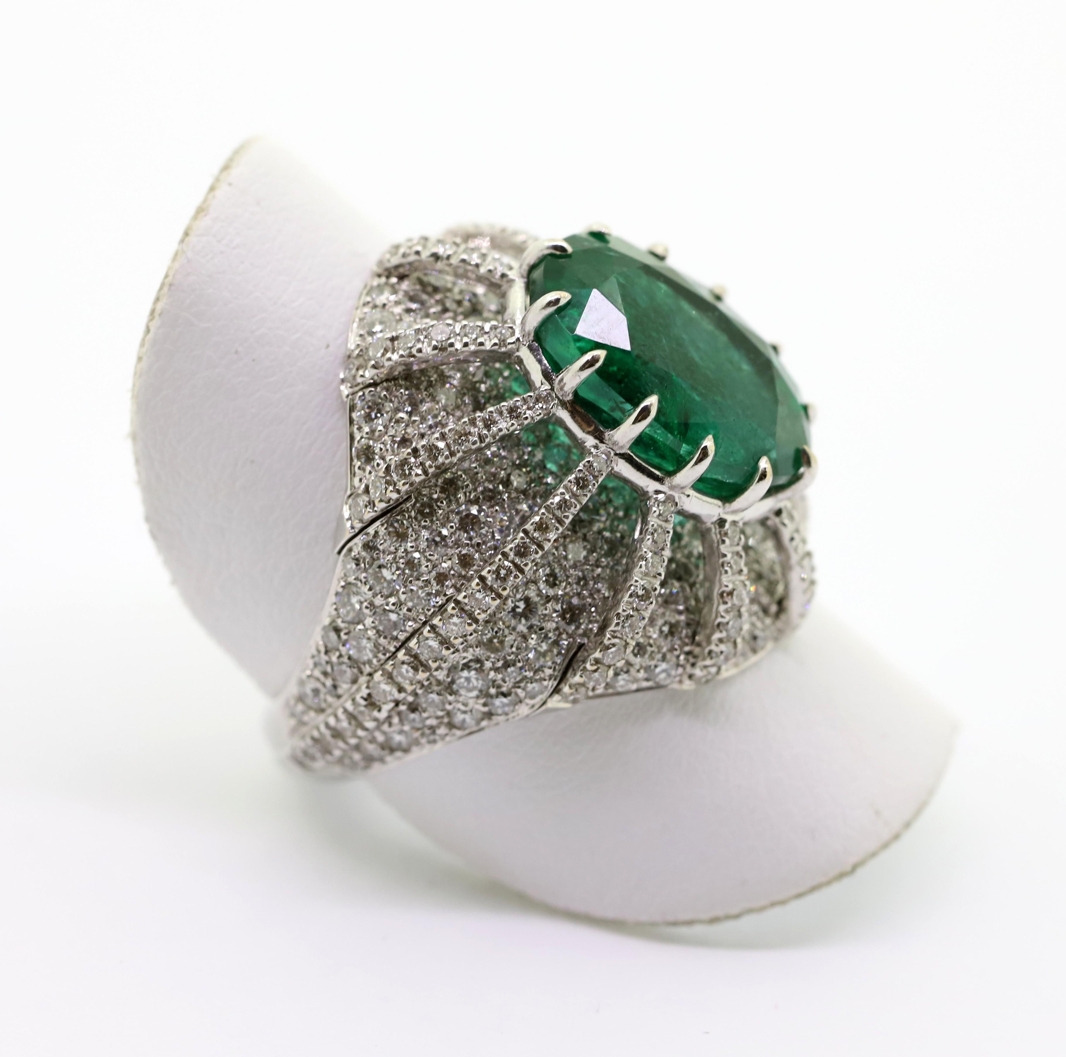Contemporary 5.28 Carat Oval Emerald and 2.40 Carat White Diamonds Cocktail Ring For Sale