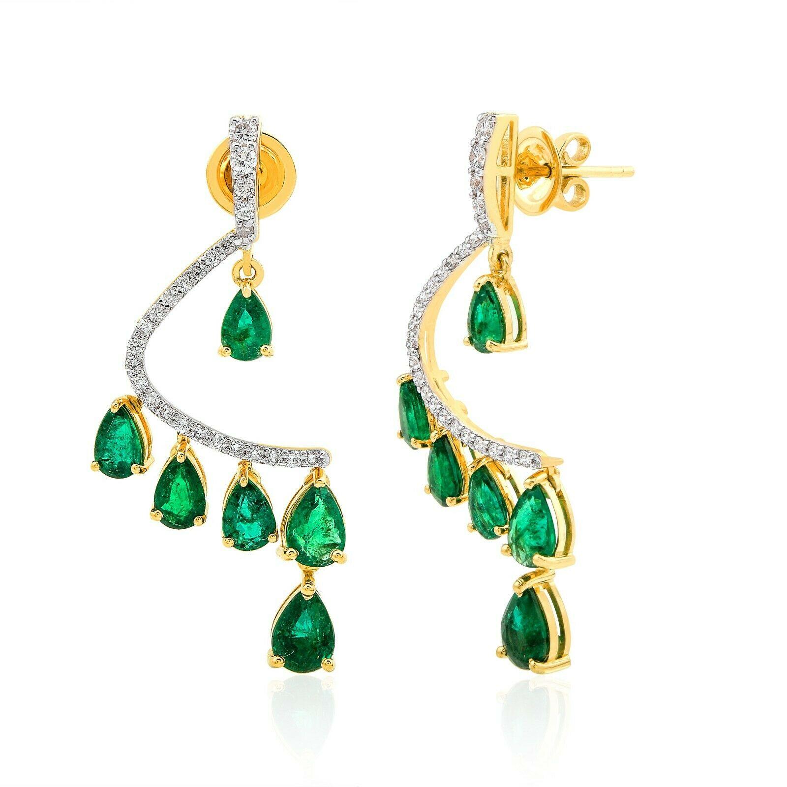 Cast in 14-karat gold, these beautiful earrings are hand set with 5.28 carats of emerald and .71 carats of sparkling diamonds. 

FOLLOW  MEGHNA JEWELS storefront to view the latest collection & exclusive pieces.  Meghna Jewels is proudly rated as a