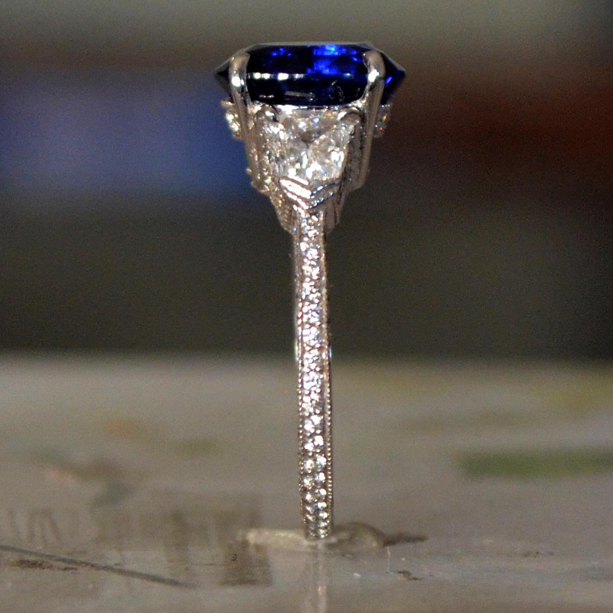 B8094002

1. Carat Weight: 5.29 Carat Sapphire

2. Color: Blue

3. Tone:  Medium - Nice, 7.5 Out of 10

4. Hue: Blue

3. Clarity:  Excellent clarity, no inclusions to the eye. VS if diamond rating.

4. Cut: This stone has a excellent cut,

5.