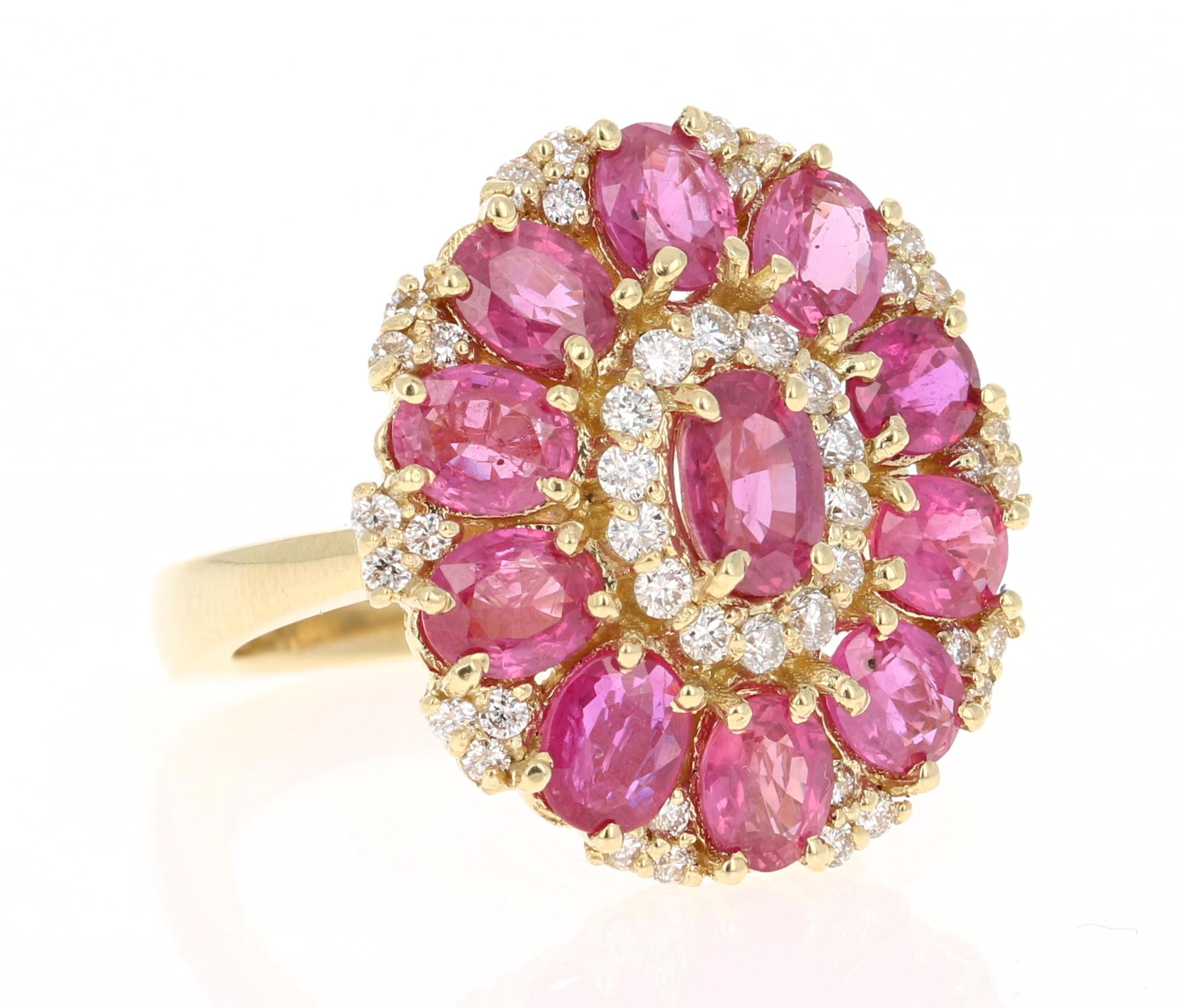 A real statement piece - 5.29 Carat Ruby and Diamond Cocktail Ring in 18K Yellow Gold!

This ring has gorgeous Burmese Rubies that weigh a total of 4.75 Carats Carat Pear Cut Ruby and is surrounded by 44 Round Cut Rubies that weigh 0.54 Carats. The