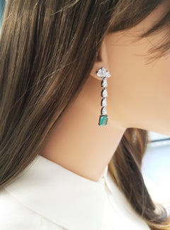 5.29 Carat Total Pear Shape Diamonds and Emerald Earrings in 14 Karat White Gold