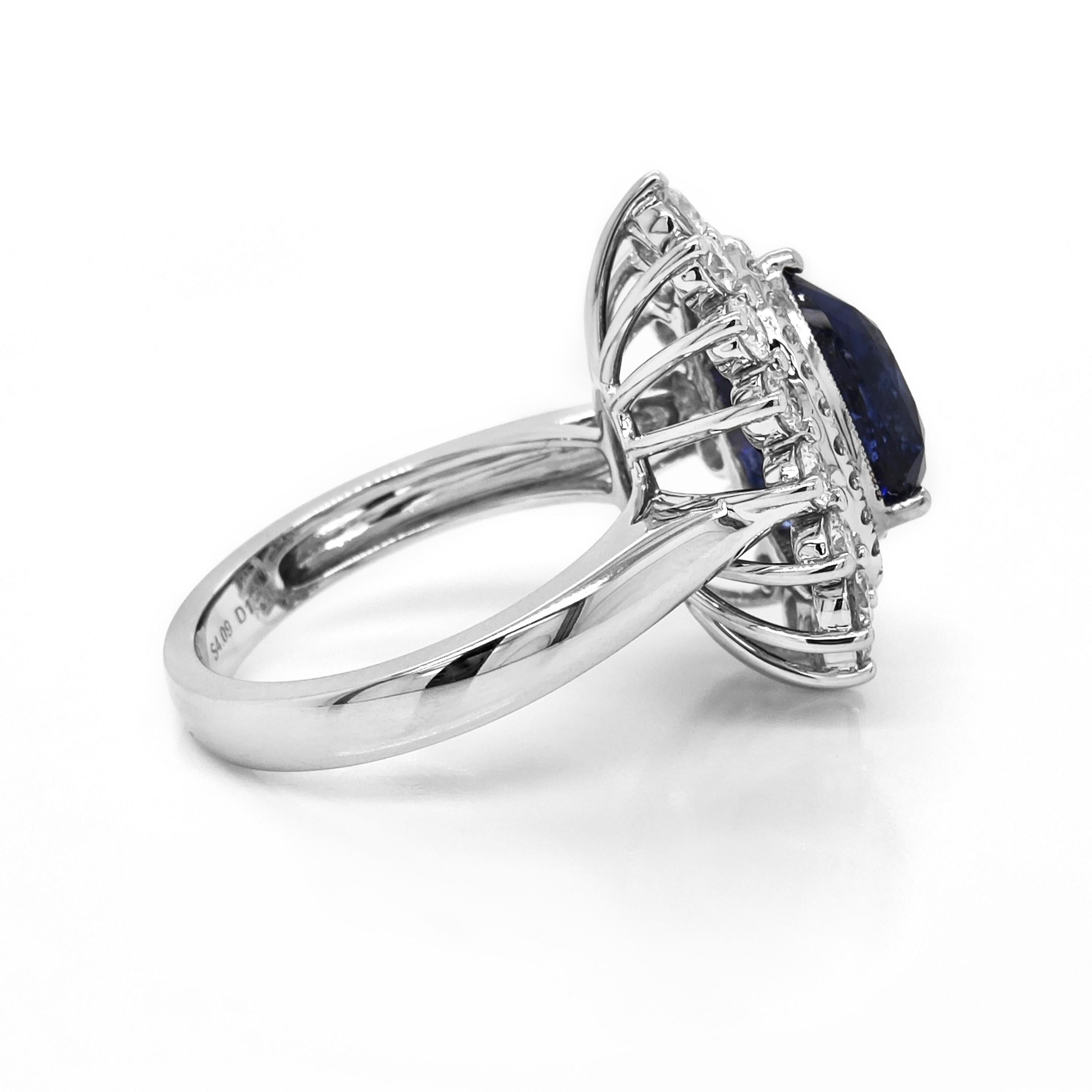 1 Sapphire Gemstone: 4.09 Carats
43 White Diamonds: 1.2 Carats
Metal: 18K White Gold, 7.40 Grams