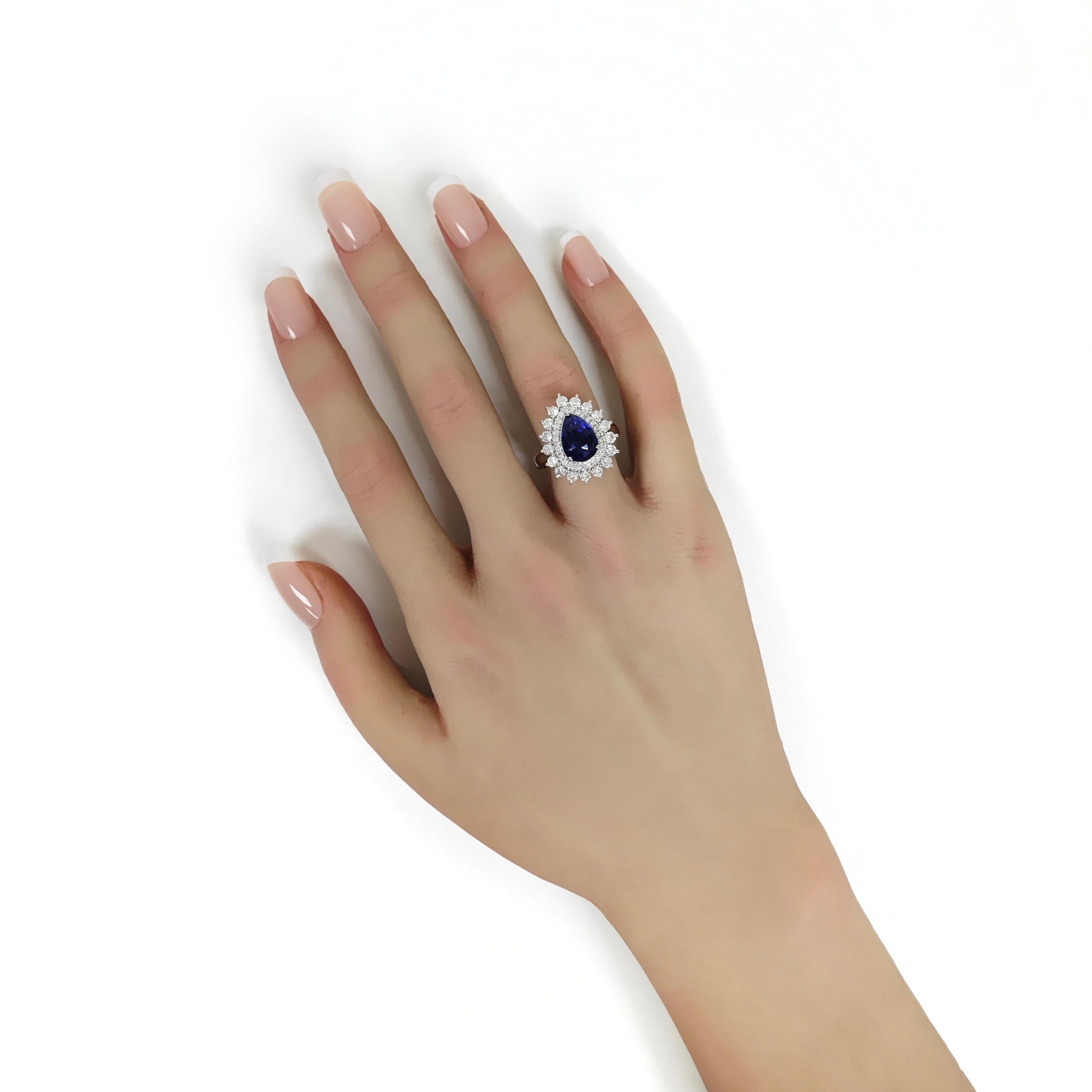 Pear Cut 5.29 Carats Sapphire and White Diamond White Gold Ring For Sale