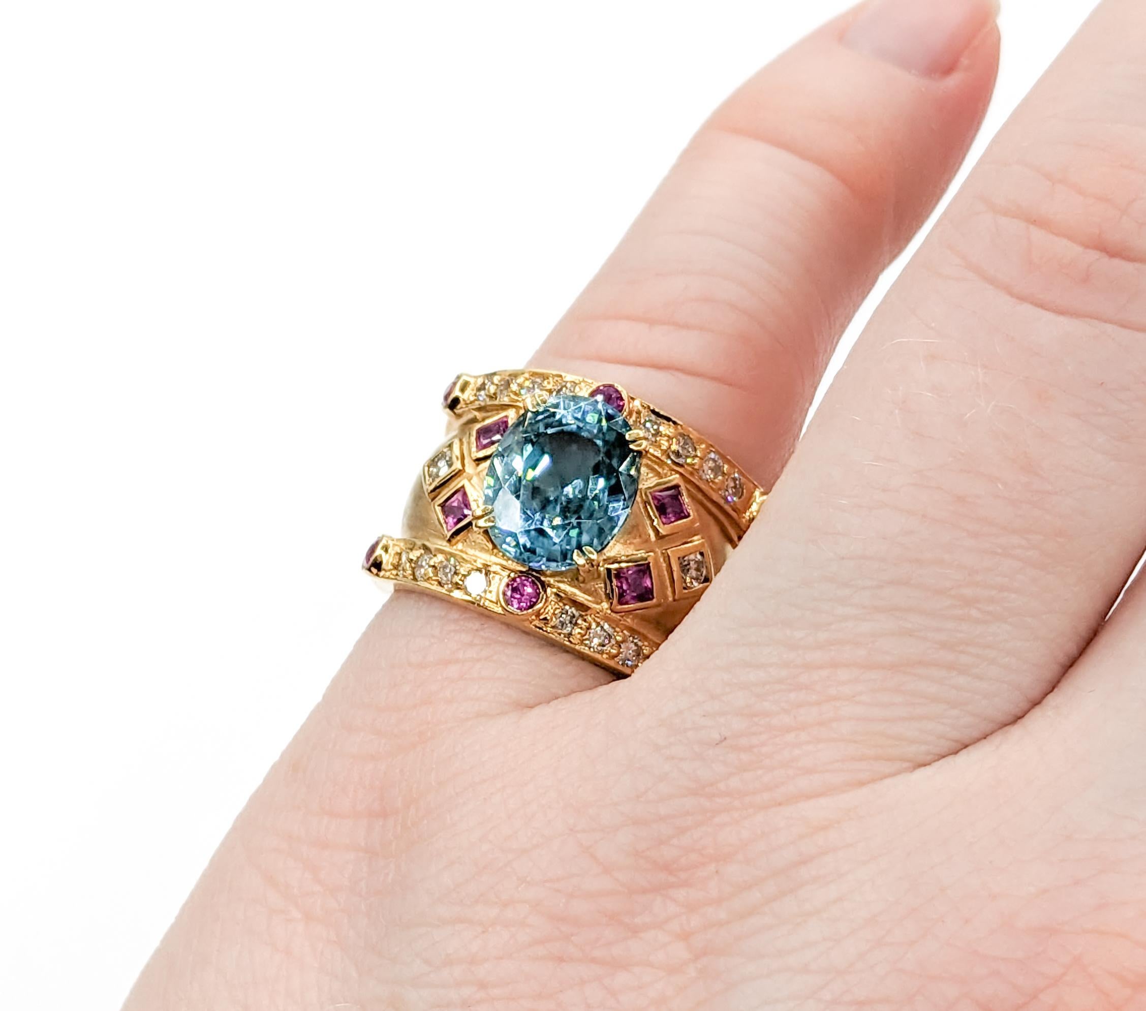 Oval Cut 5.2ct blue zircon & Diamond & .50ctw Pink Sapphire Ring In Yellow Gold For Sale