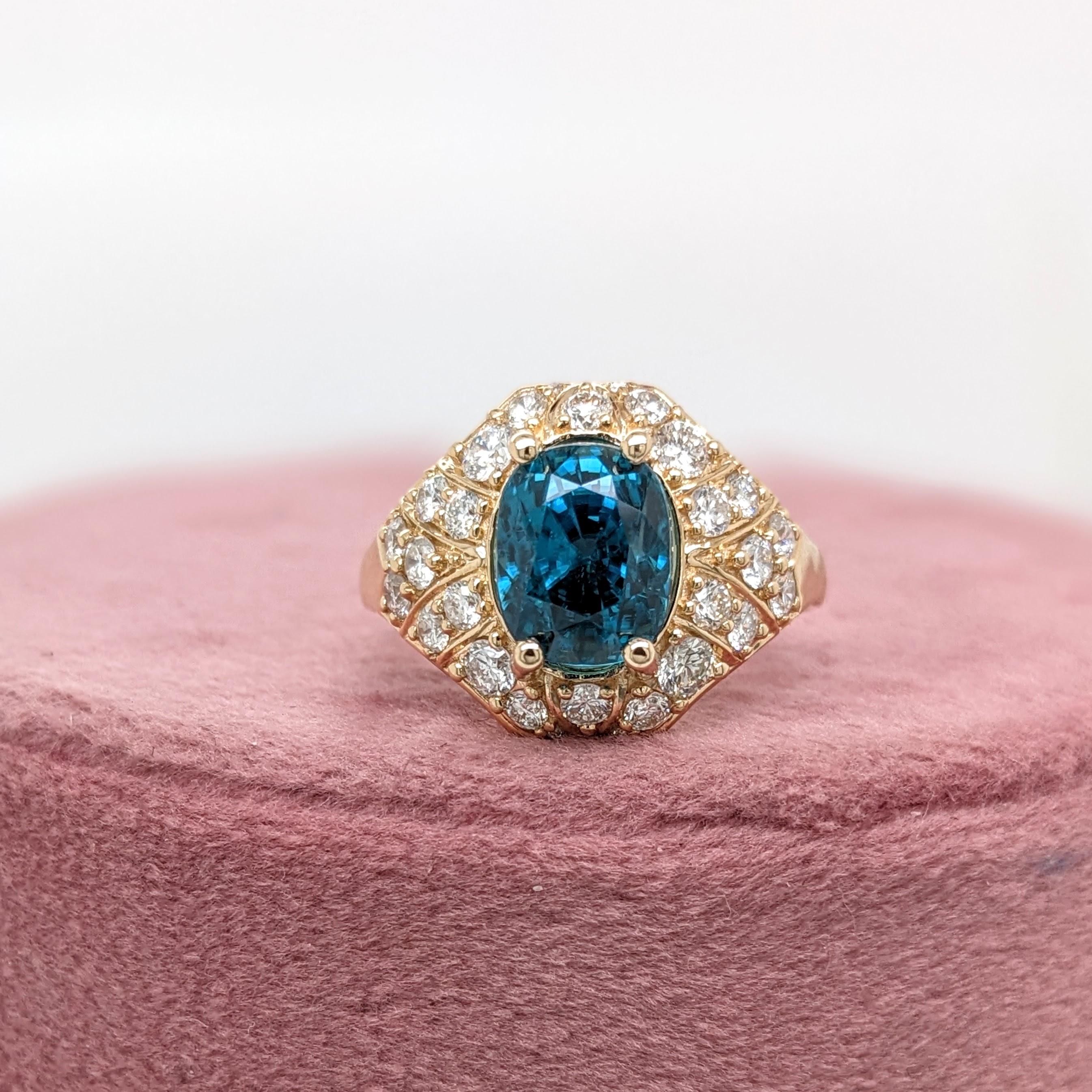 Claim this captivating natural blue zircon for yourself or your loved ones! A masterpiece of nature set in 14K yellow gold with natural diamonds. A gorgeous ring for a modern bride, a December baby, or a lover of things blue and sparkly!

In the
