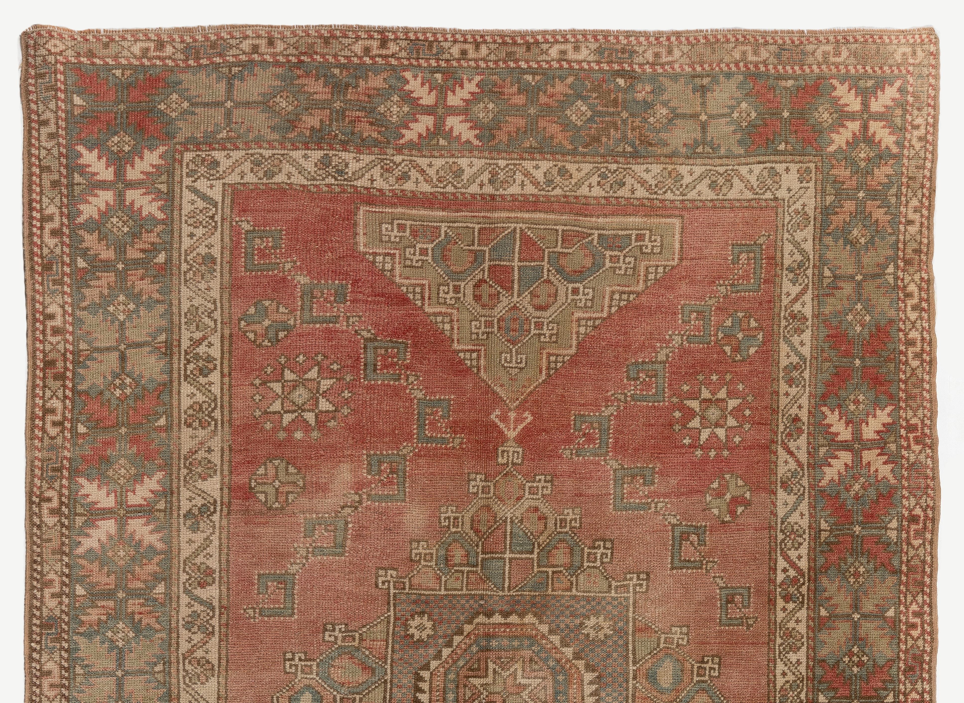 An antique Turkish rug from West Anatolia. Measures: 5.2 x 7.5 ft
100% wool. Soft, medium pile.
Sturdy and can be used on a high traffic area, suitable for both residential and commercial interiors.
Washed professionally.

