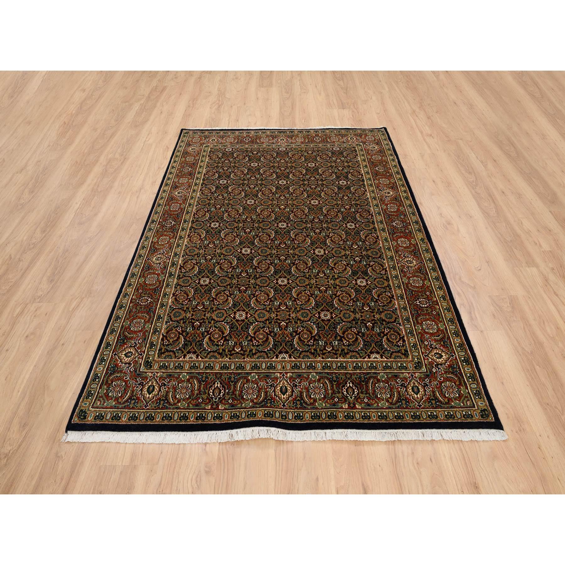 This is a truly genuine one-of-a-kind Ink Black Hand Knotted Herati with All Over Design, 250 KPSI Dense Weave Wool, Oriental Rug. It has been Knotted for months and months in the centuries-old weaving craftsmanship techniques by expert