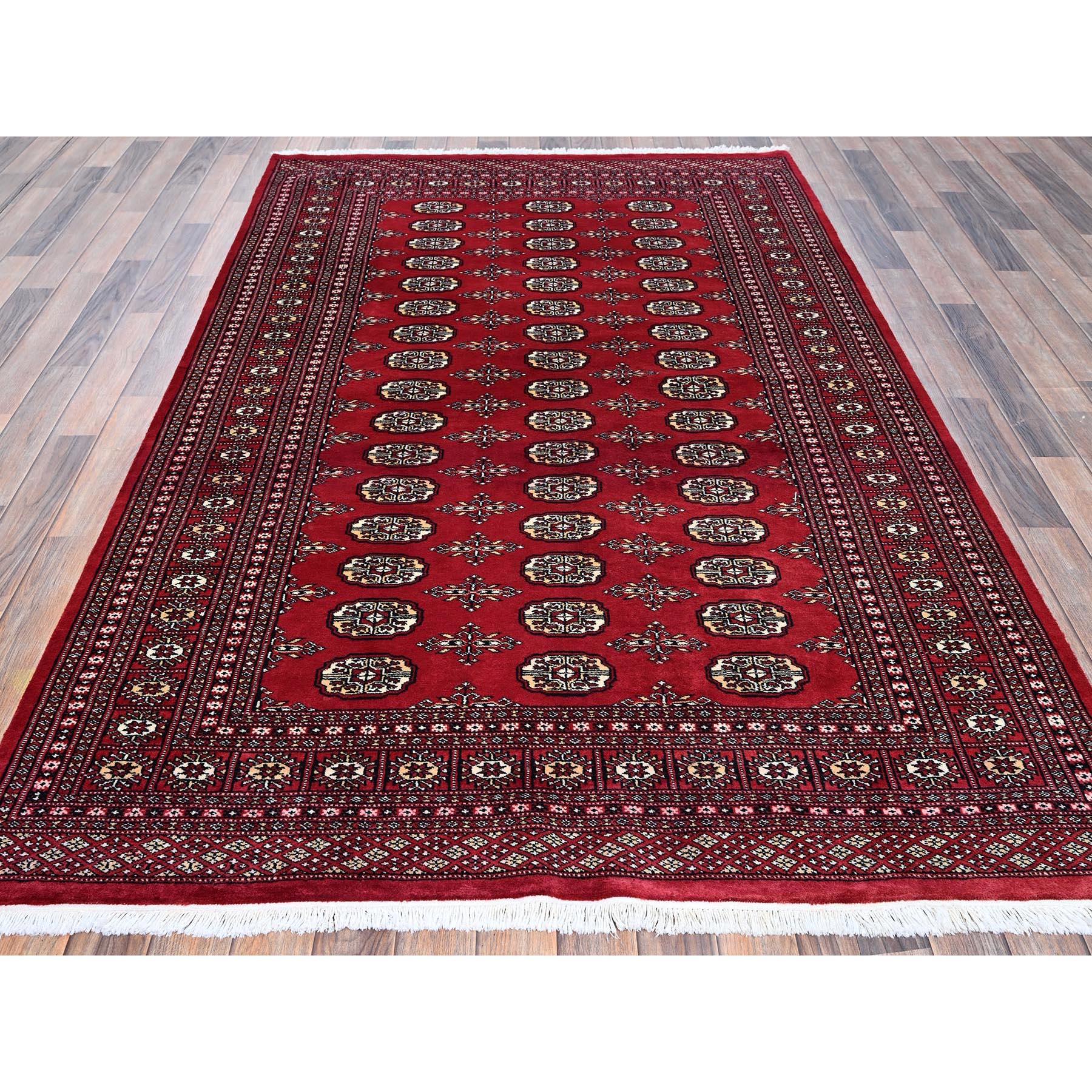 Lychee Red, Princess Bokara with Tribal Medallions, Vegetable Dyes, Soft and Velvety Wool, Hand Knotted, Oriental Rug
Primary materials: Wool
Latex: No Pile 
height: 0.25 Inches
Style: Traditional
Primary color: Red
Secondary colors: Ivory, Beige,