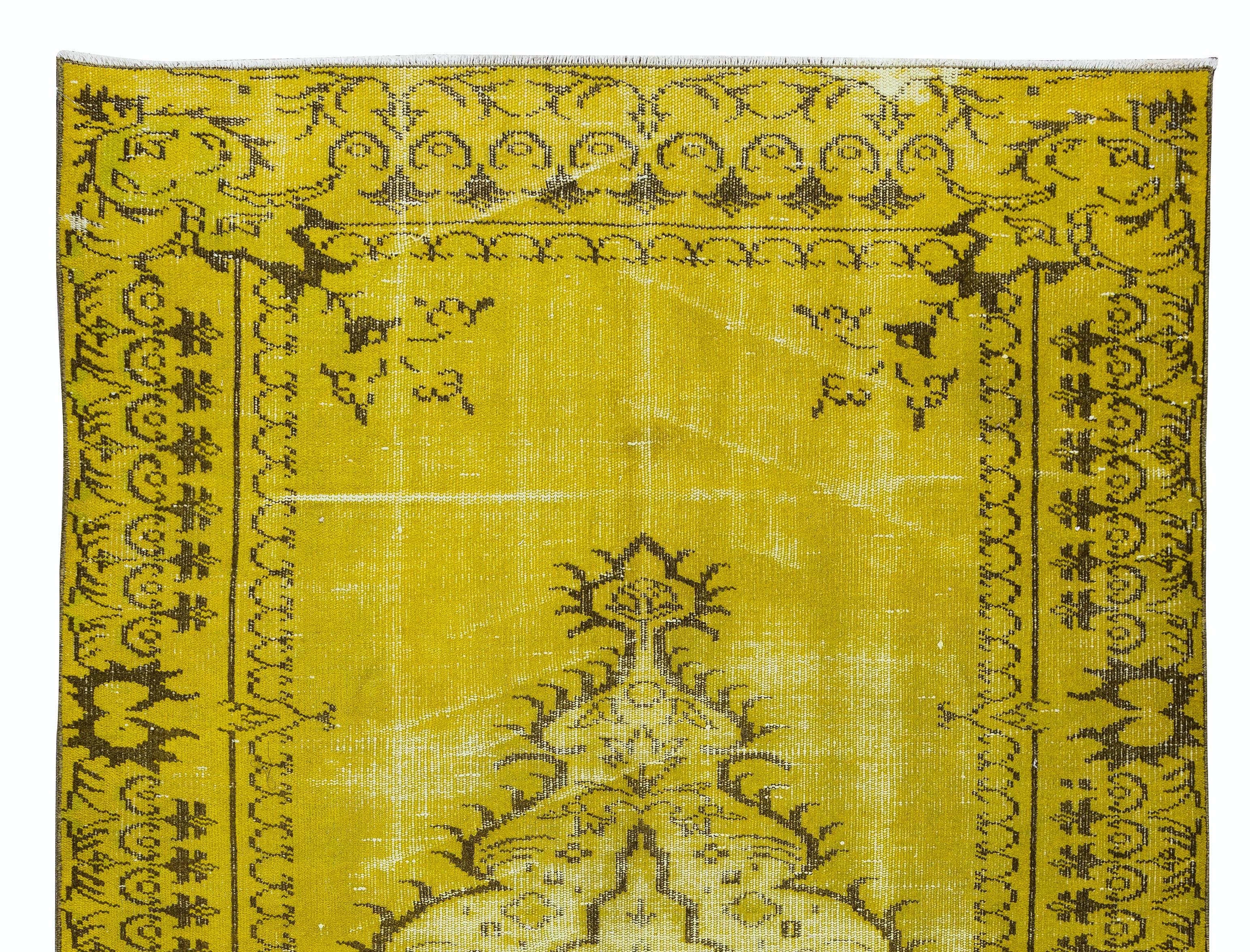 Hand-Knotted 5.2x8.3 Ft Vintage Handmade Turkish Rug Overdyed in Yellow with Medallion Design For Sale