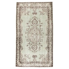 5.2x9 Ft HandKnotted Vintage Central Anatolian Area Rug in Shades of Light Green
