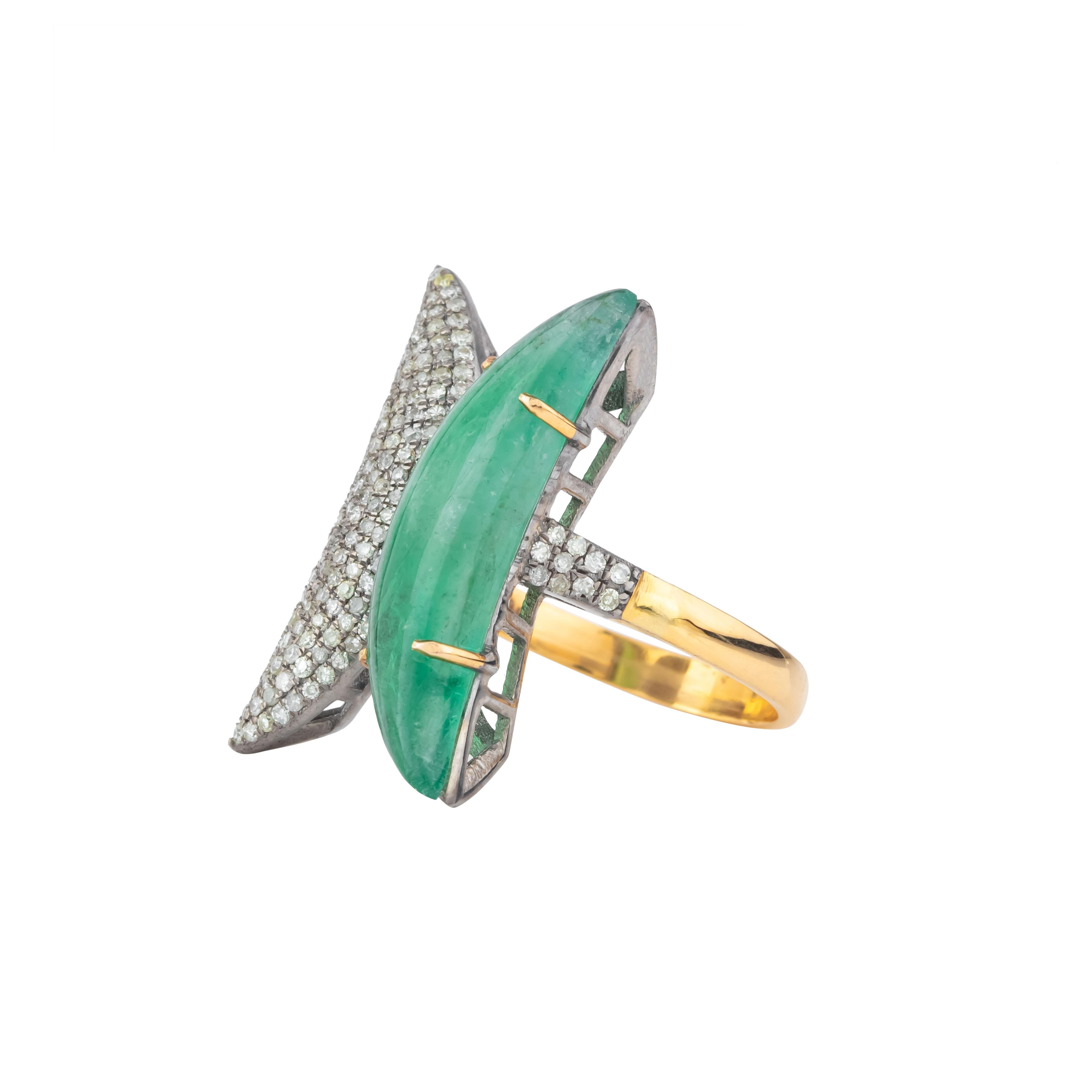The 5.3 Carat Diamond and Emerald Fashion Ring exudes an unparalleled aura of sophistication and glamour. This exquisite piece harmoniously marries vibrant emeralds with scintillating diamonds, resulting in a design that epitomizes luxury and modern