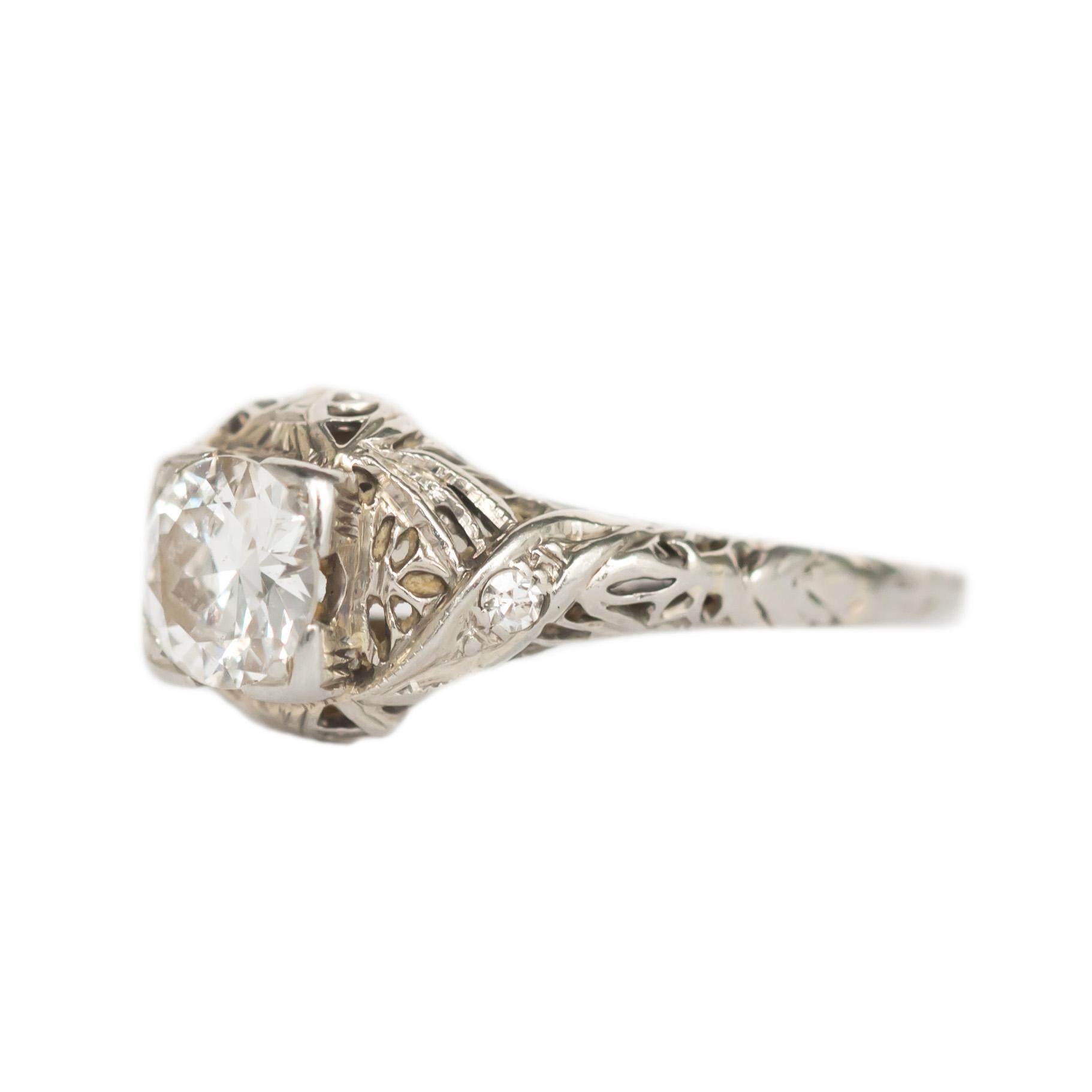 Item Details: 
Ring Size: 5
Metal Type: 18 karat White Gold [Hallmark & Tested]
Weight: 1.9 grams

Center Diamond Details
Shape: Old European Brilliant
Carat Weight: .53 carat
Color: I
Clarity: SI1

Side Stone Details: 
Shape: Single Cut
Total Carat