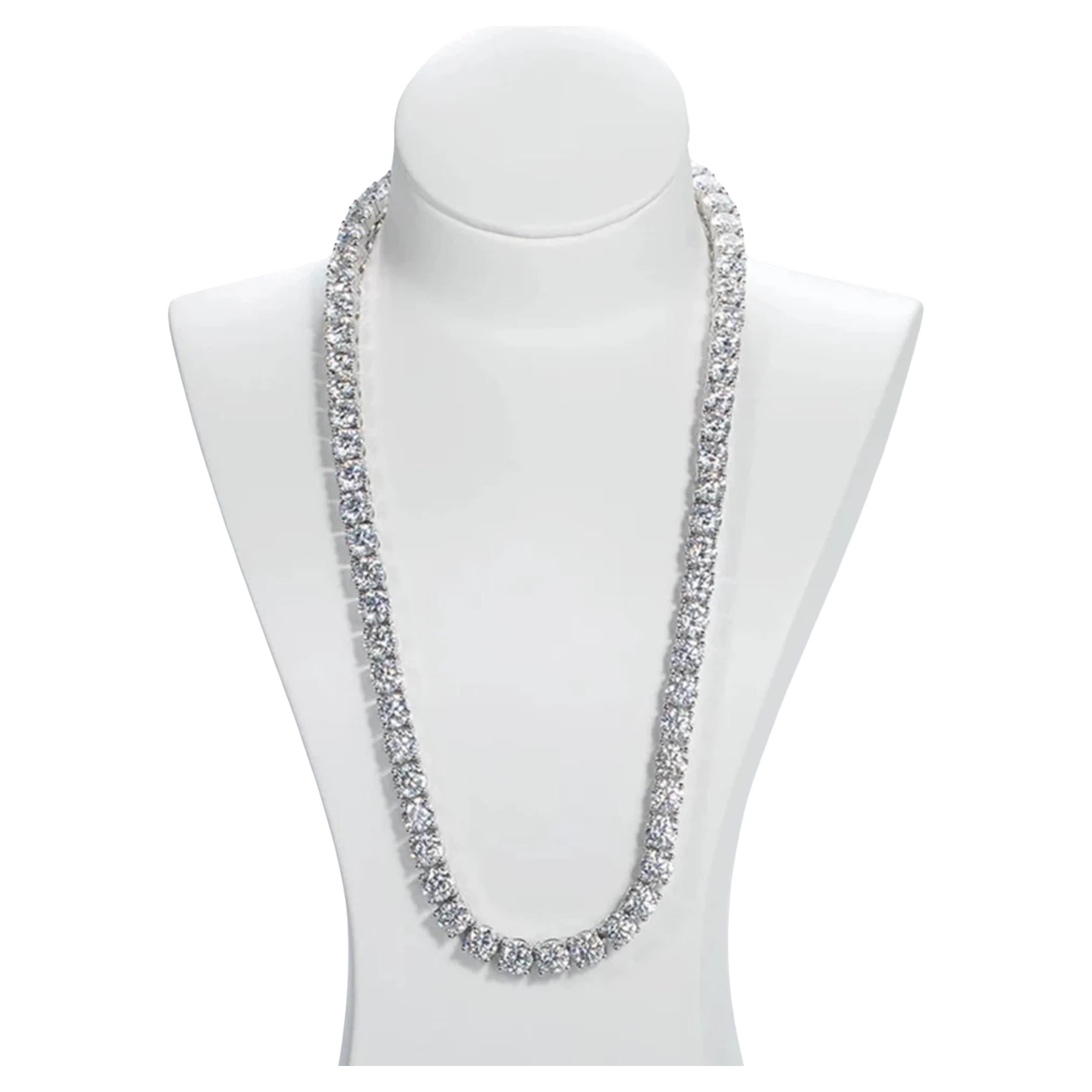 This gorgeous necklace 
Experience the epitome of luxury with our stunning 53 carats Diamonds Riviera Necklace crafted meticulously in 14K White Gold, boasting a weight of 32.55 grams. This exquisite piece is a true testament to timeless elegance