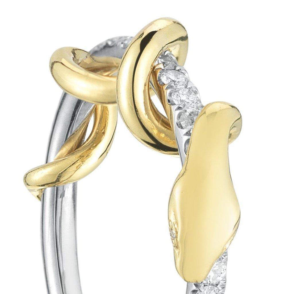 The .53 Carat Pave Diamond Articulated Snake Ring is an intricate piece. The 18 karat gold snake was designed to wrap itself around the white gold ring. It's wound gently enough that it can move and spin freely around the band. The snake has little