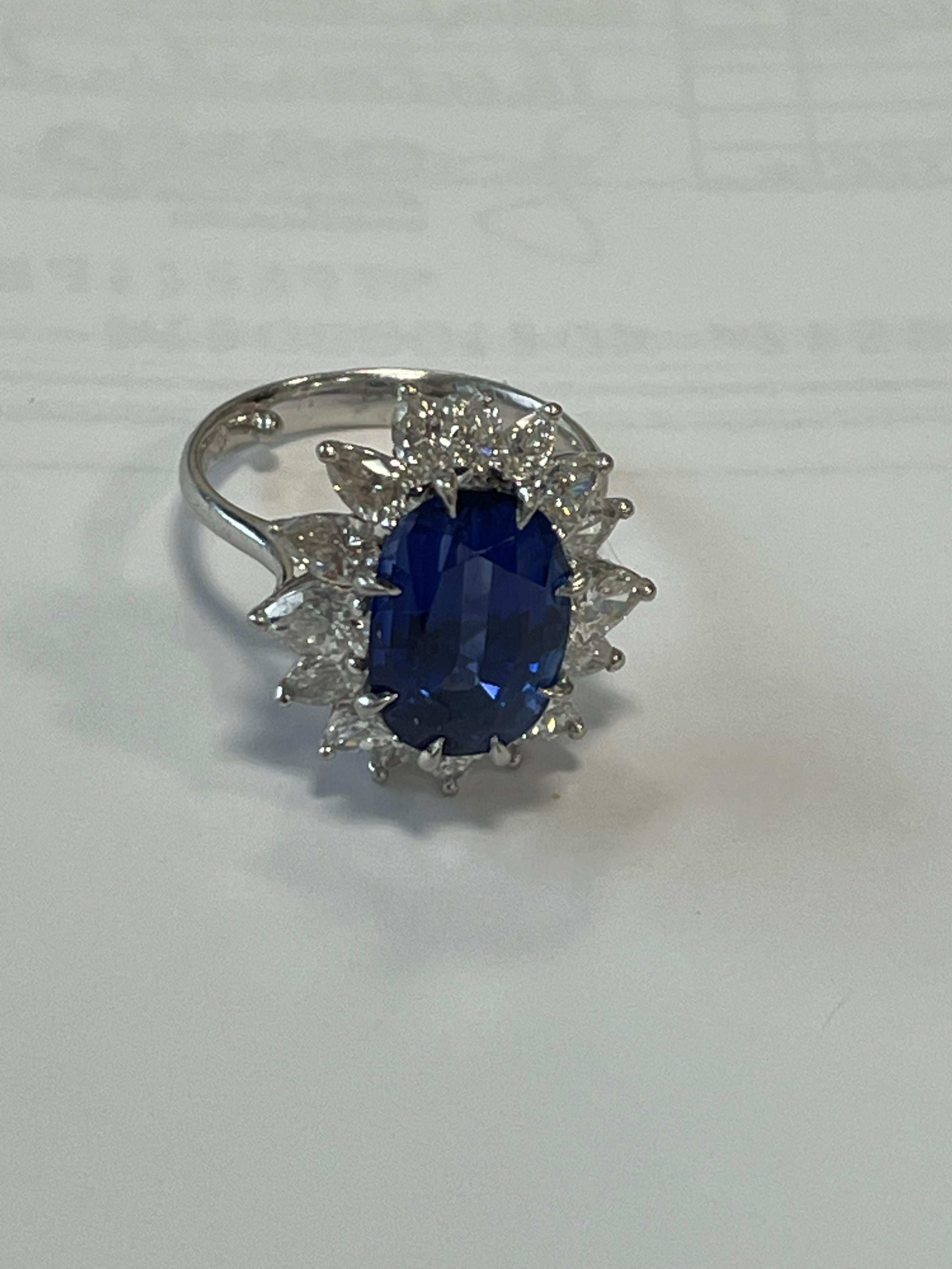 5.30 Ceylon Sapphire 5.30  American Gemological Laboratory (AGL) #cs68197
16 colorless to near colorless Pear Shape diamonds 1.65 carats
handmade wire mounting by McTigue