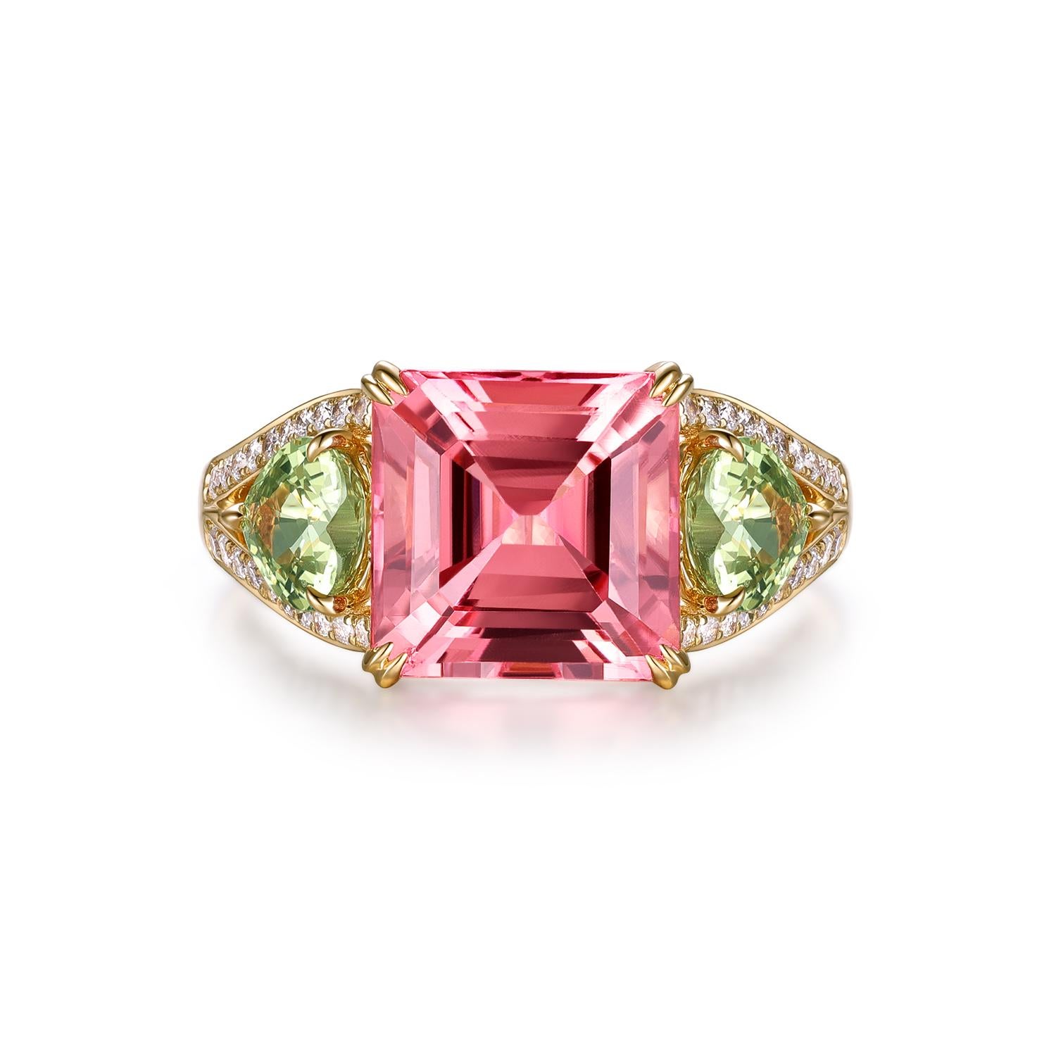 This elegant 14-karat yellow gold ring showcases a stunning 4.08-carat pink tourmaline at its center, flanked by two fancy sapphires totaling 1.21 carats. The soft green hue of the sapphires adds a unique contrast to the vibrant pink of the