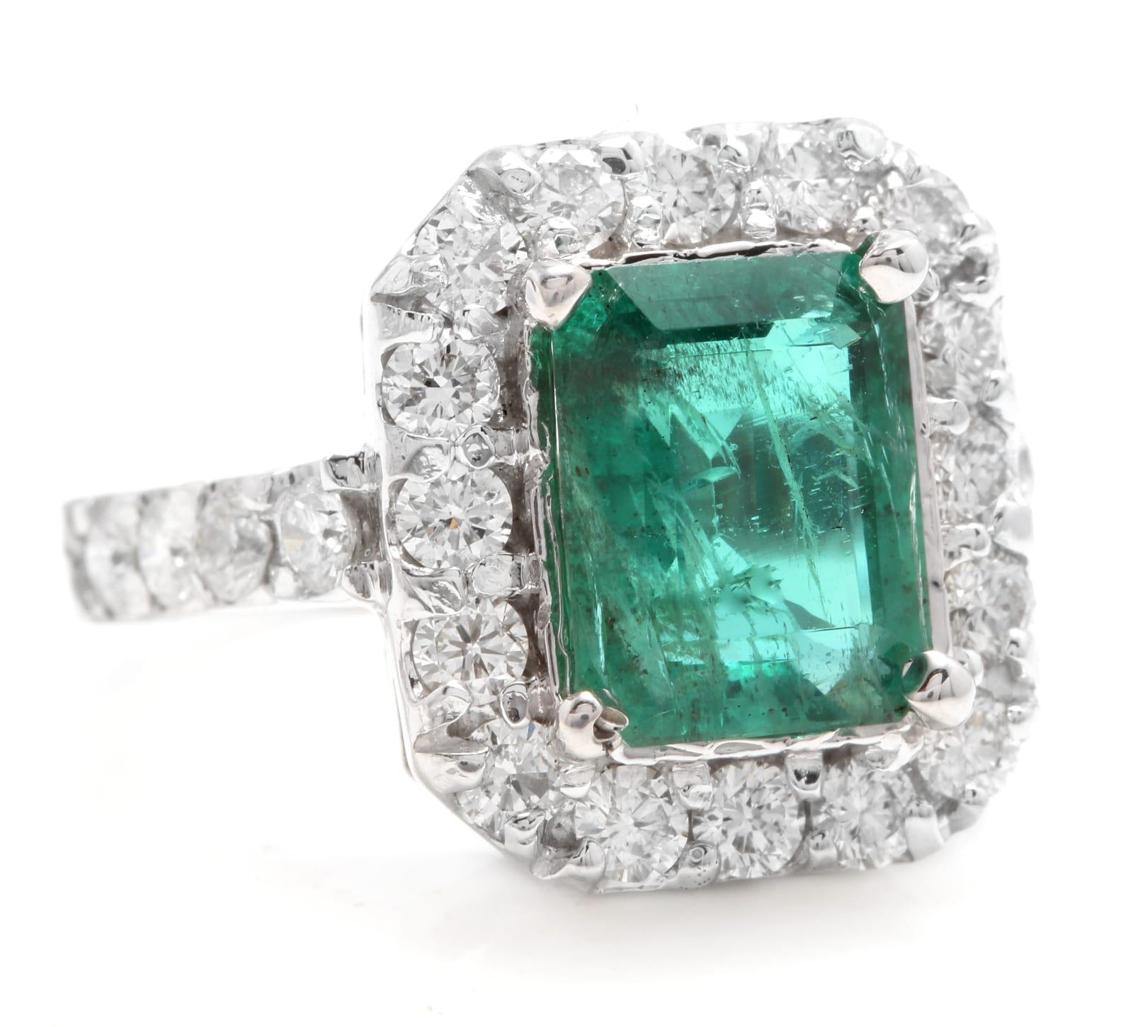 5.30 Carats Natural Emerald and Diamond 14K Solid White Gold Ring

Total Natural Green Emerald Weight is: Approx. 4.00 Carats (transparent)

Emerald Measures: Approx. 10 x 8mm

Emerald Treatment: Oiling

Natural Round Diamonds Weight: Approx. 1.30
