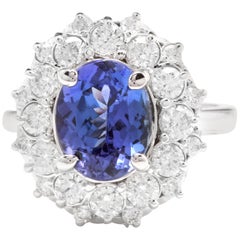 Anello con tanzanite naturale da 5,30 carati e diamante in oro bianco massiccio da 14 carati