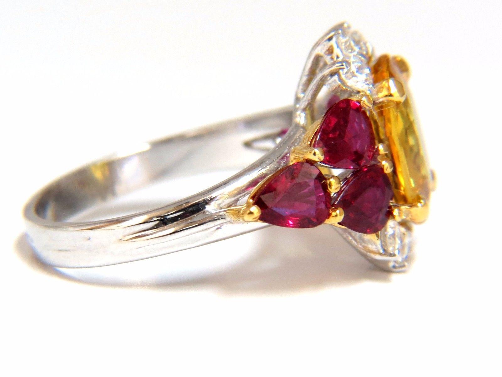 Natural Ruby & Yellow Sapphire diamonds ring.

3.00ct. Natural yellow Sapphire

10.2 X 7.6mm 

Full cut oval brilliant 

Clean Clarity & Transparent

Prime Vivid Yellow



1.88ct natural (6) ruby pear shapes on sides

Clean clarity &