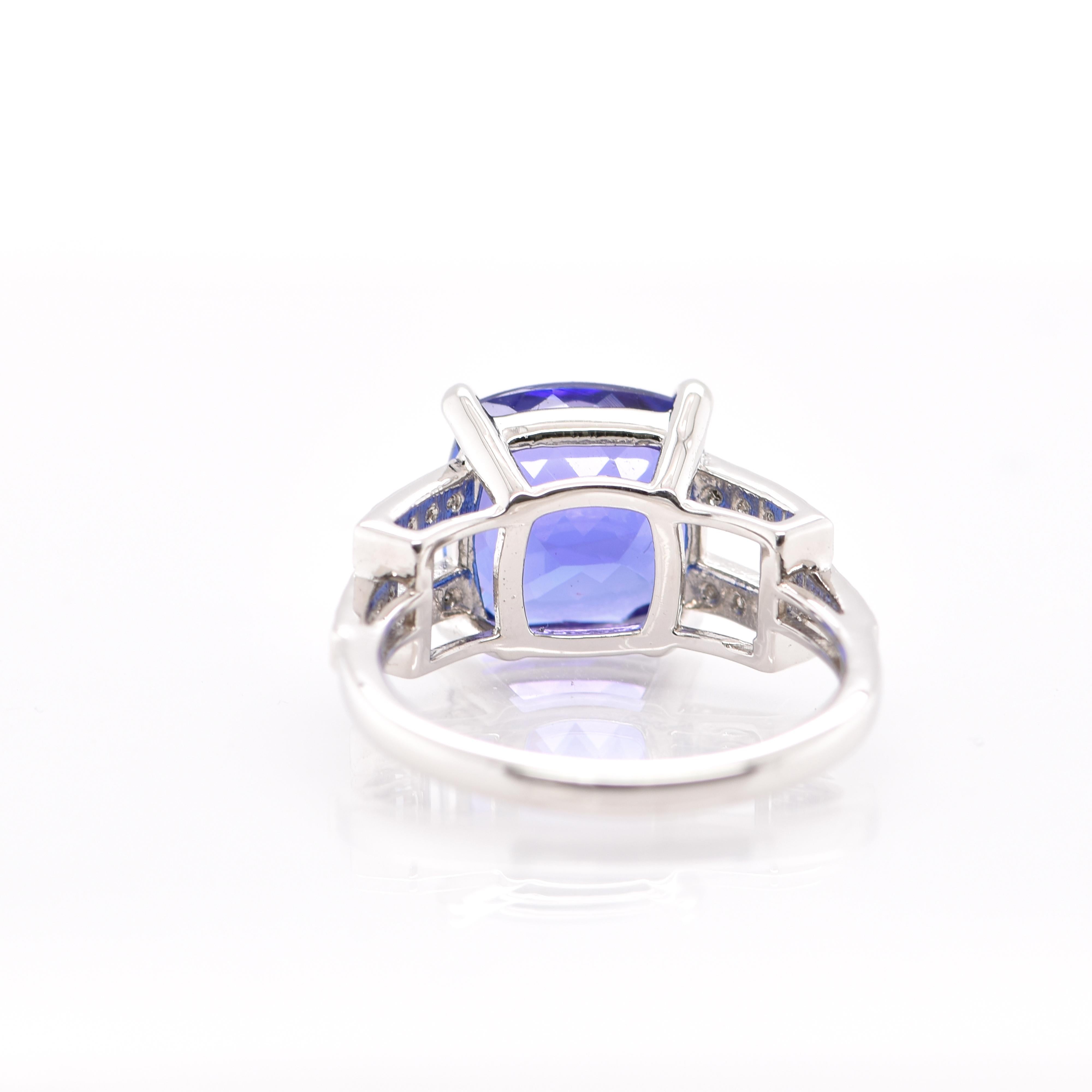 A beautiful Cocktail Ring featuring a 5.30 Carat Tanzanite and 0.16 Carats of Diamond Accents set in Platinum. Tanzanite's name was given by Tiffany and Co after its only known source: Tanzania. Tanzanite displays beautiful pleochroic colors meaning
