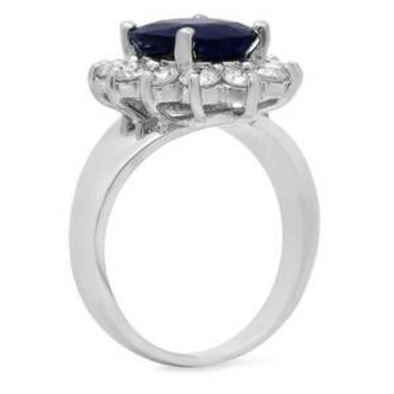 5.30 Carats Exquisite Natural Blue Sapphire and Diamond 14K Solid White Gold Ring

Total Blue Sapphire Weight is: Approx. 4.50 Carats

Sapphire Measures: Approx. 11.00 x 9.00mm

Sapphire Treatment: Diffusion

Natural Round Diamonds Weight: Approx.