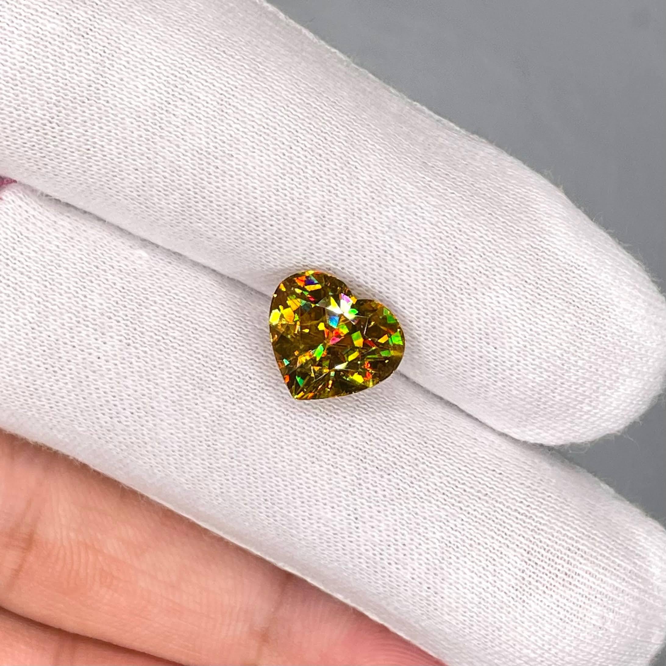 Weight 5.30 carats 
Dimensions 10.2x11.7x6.9 mm
Treatment none 
Origin Madagascar 
Clarity VVS 
Shape Heart 
Cut Heart 



The 5.30 carat Sphene stone, elegantly fashioned into a heart shape, embodies the epitome of fine quality and craftsmanship.