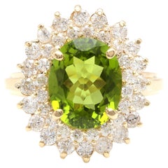 5,30 Karat beeindruckender Ring mit natürlichem Peridot und Diamant aus 14 Karat Gelbgold
