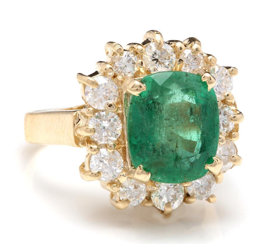 5.30 Carats Natural Emerald and Diamond 14K Solid Yellow Gold Ring

Suggested Replacement Value: Approx. $8,600.00

Total Natural Cushion Cut Emerald Weight is: Approx. 4.00 Carats (transparent high quality)

Emerald Measures: Approx. 9.70 x