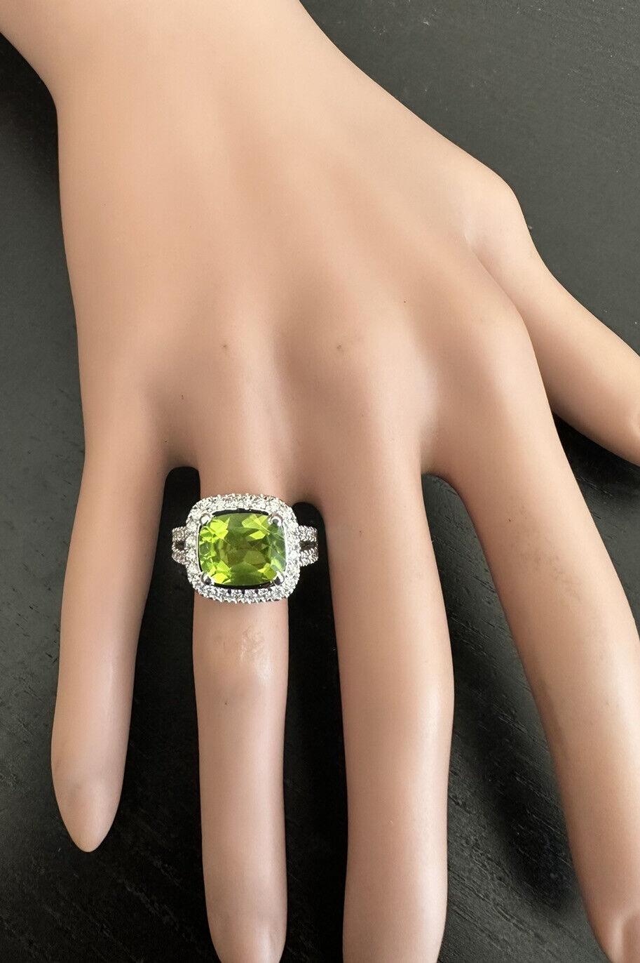 Women's 5.30 Carats Natural Very Nice Looking Peridot and Diamond 14k Solid White Gold For Sale