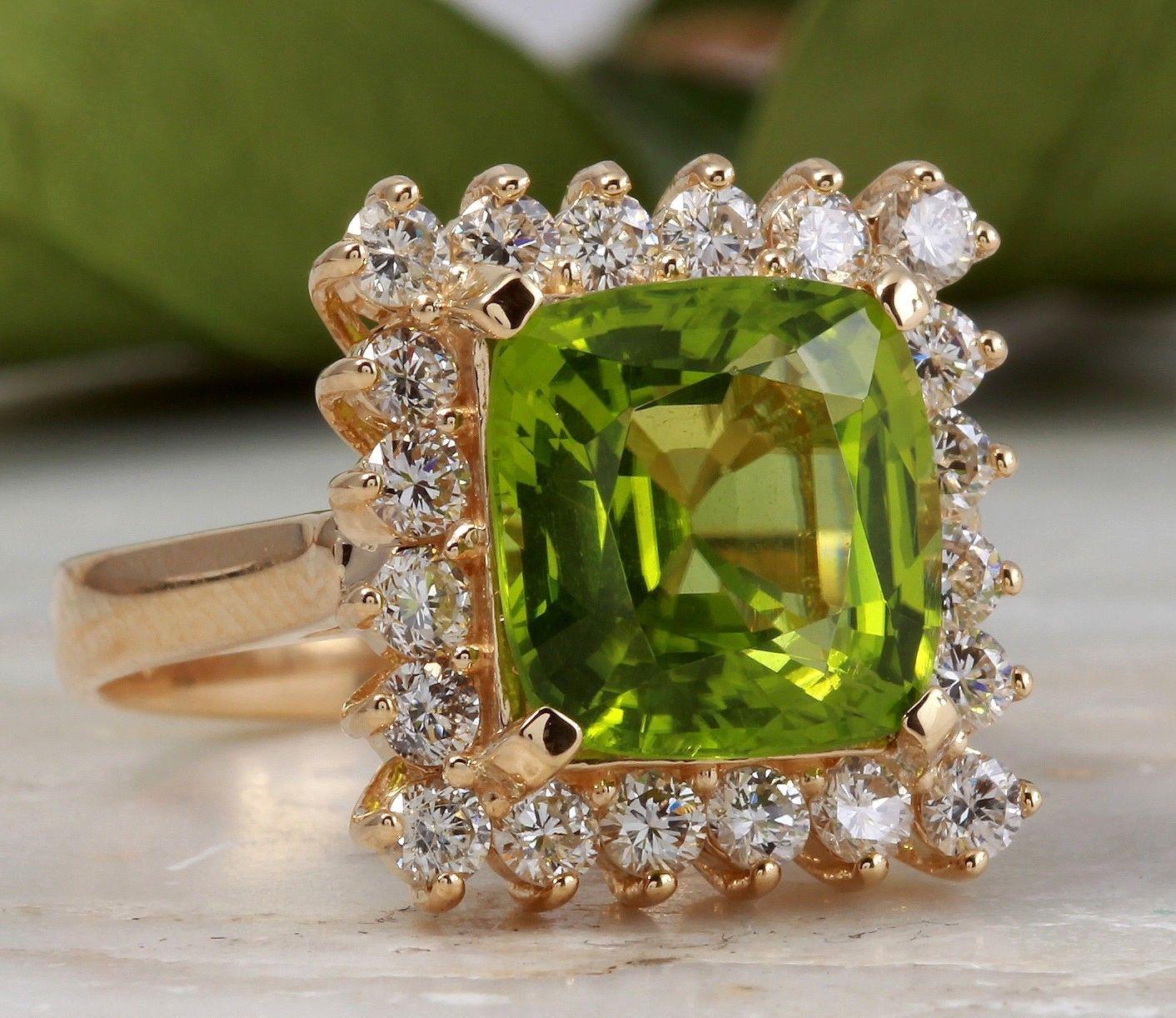 5.30 Carats Natural Very Nice Looking Peridot and Diamond 14K Solid Yellow Gold Ring

Total Natural Cushion Cut Peridot Weight is: Approx. 4.50 Carats

Peridot Measures: Approx. 8.00 x 8.00mm

Natural Round Diamonds Weight: Approx. 0.80 Carats