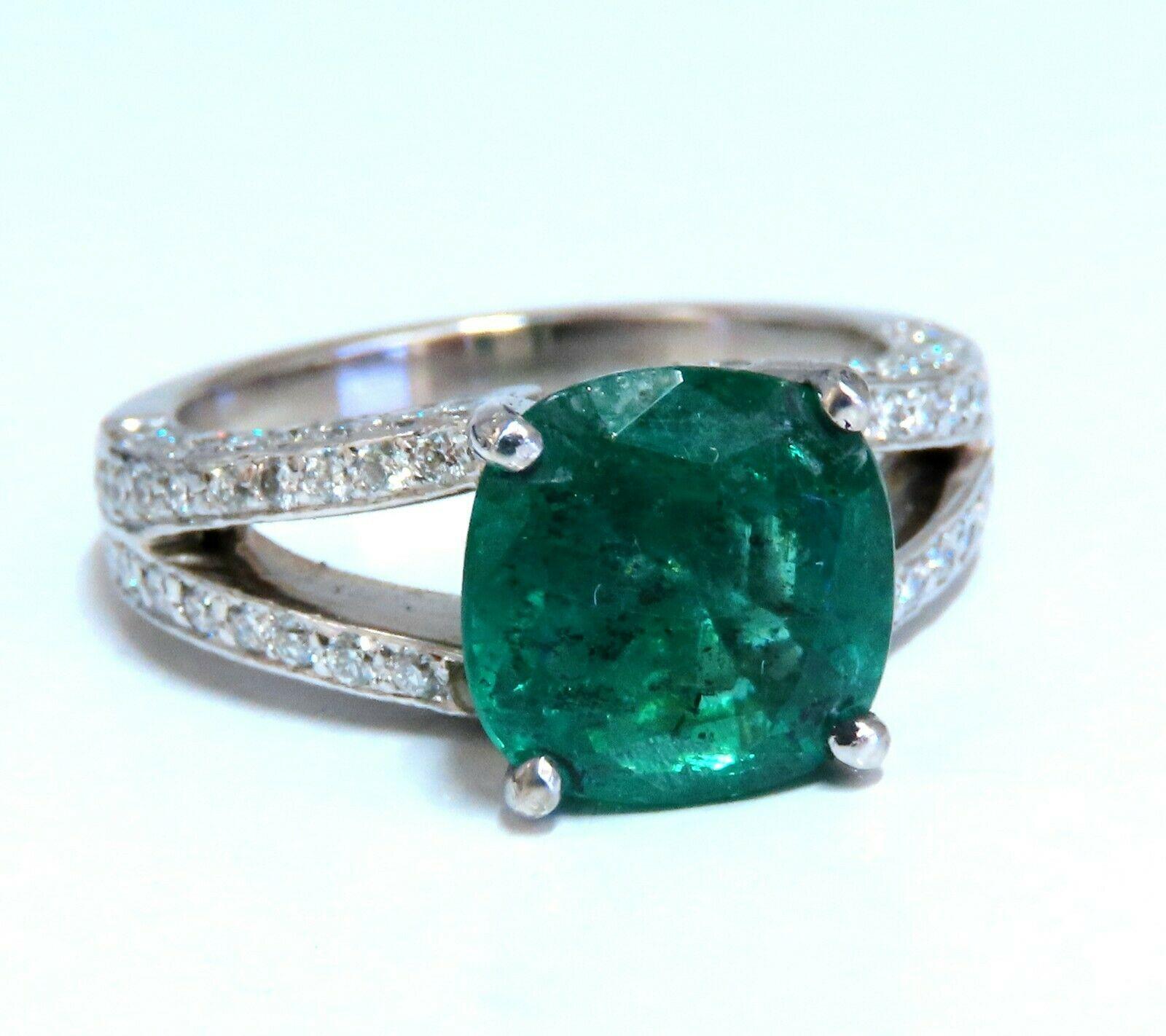 Split Shank Raised Cosmopolitan.

4.10ct. Natural Emerald Ring

Emerald, Brilliant Cushion cut

9.5 x 9.4mm Diameter

Transparent & Vivid Green 

1.20ct. Diamonds.

Round & full cuts 

G-color Vs-2 clarity.  

Platinum

9.8 grams

Ring Current size: