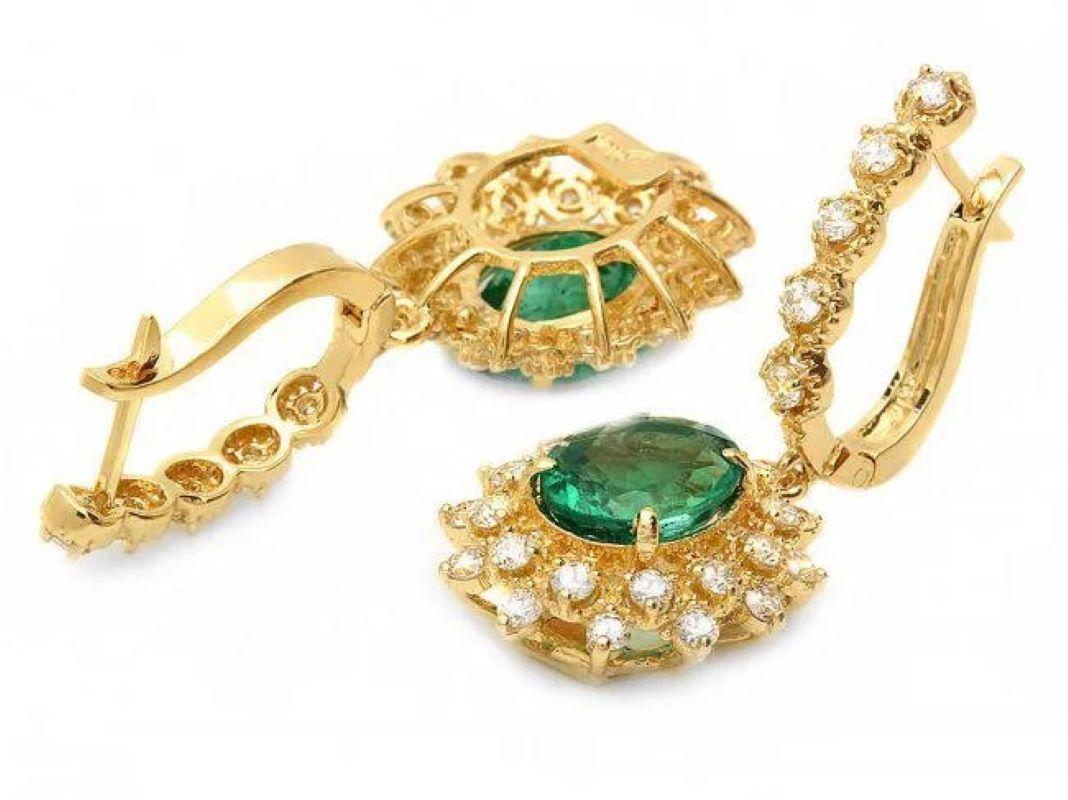5.30ct Natural Emerald and Diamond 14K Solid Yellow Gold Earrings

Total Natural Oval Emeralds Weight: Approx.  3.90 Carats

Emerald Measures: Approx.  9 x 7 mm

Total Natural Round Cut White Diamonds Weight: Approx.  1.40 Carats (color G-H /