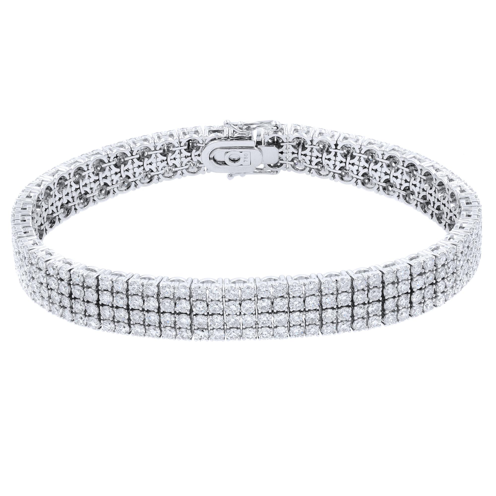 Four row brilliant white diamonds bracelet. A four row of brilliant white diamonds are the centerpiece of this 18k white gold bracelet. Handcrafted with over 5 carats of round diamonds, this exclusive will steal your heart. 
Carat Weight: