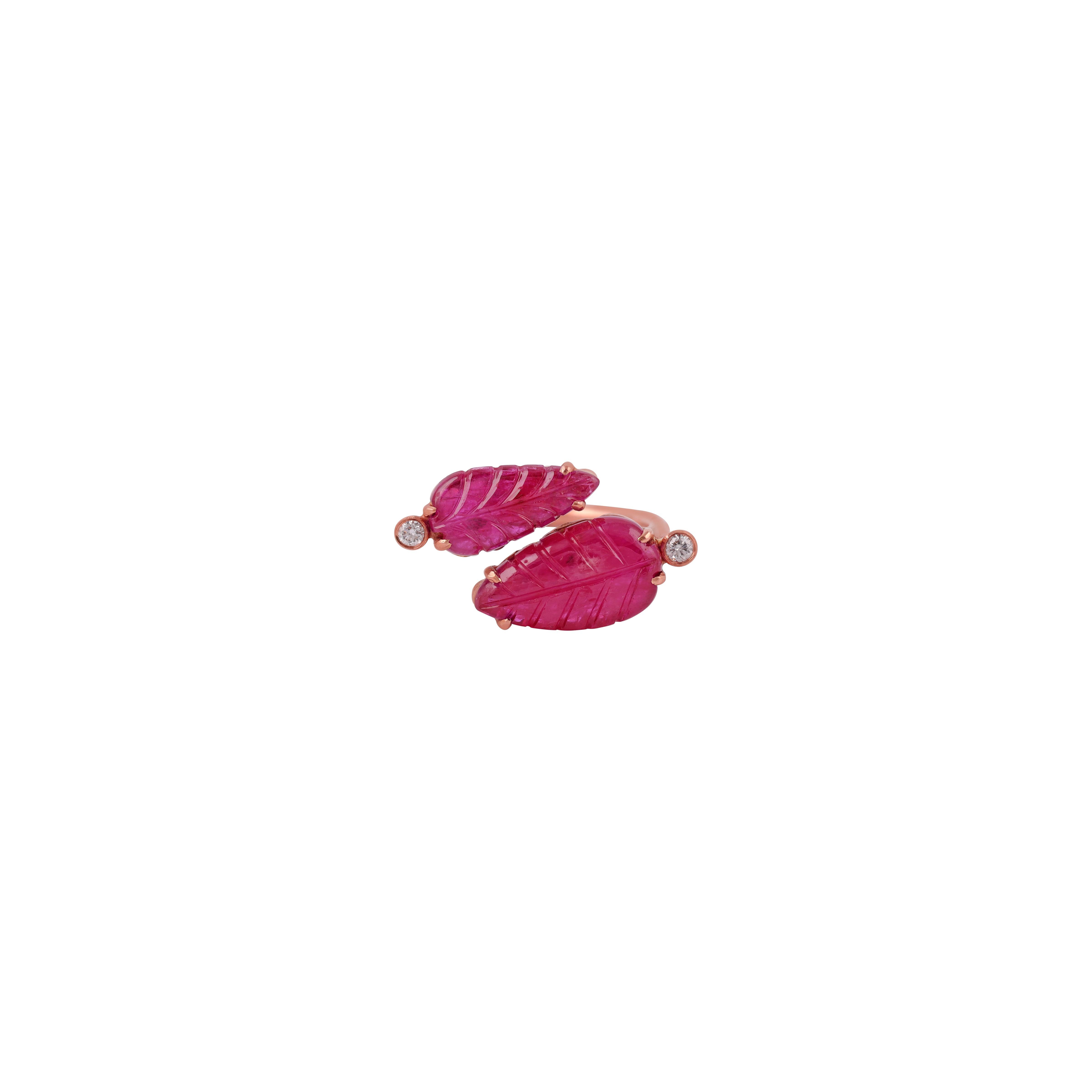 Carved Leaf  Ruby with  diamonds around this ring is a very attractive and beautiful looking.

Ring size: 7 ( Can be sized for a cost )

18k : 4.41 gms
Diamond : 0.08 Cts
Ruby: 5.31 Cts

