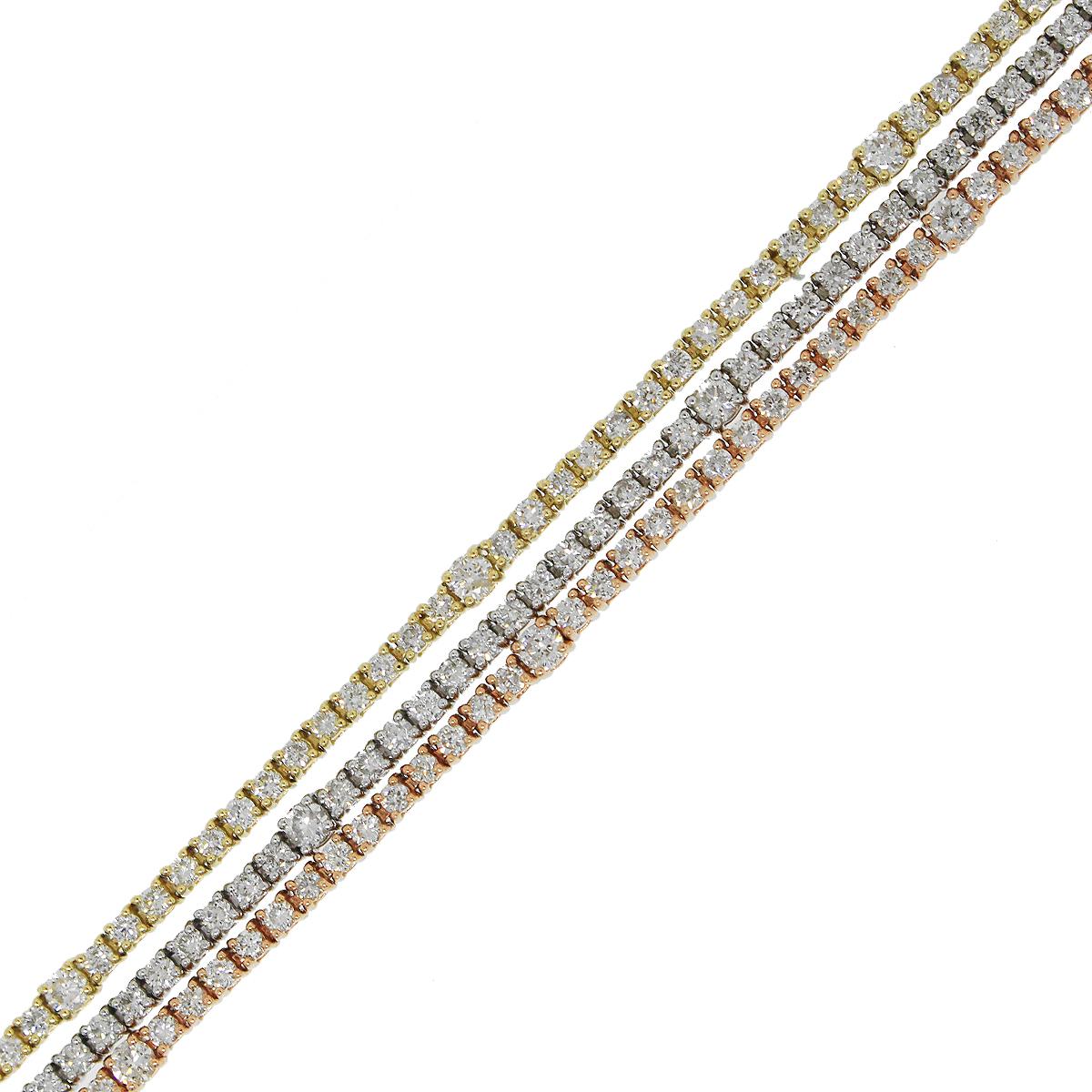 Material: 18k White Gold, 18k Rose Gold, 18k Yellow Gold
Diamond Details: Approximately 5.31ctw round brilliant diamonds. Diamonds are H/I in color and SI1 in clarity.
Clasp: Tongue in box clasp with safety latch
Total Weight: 18.4g